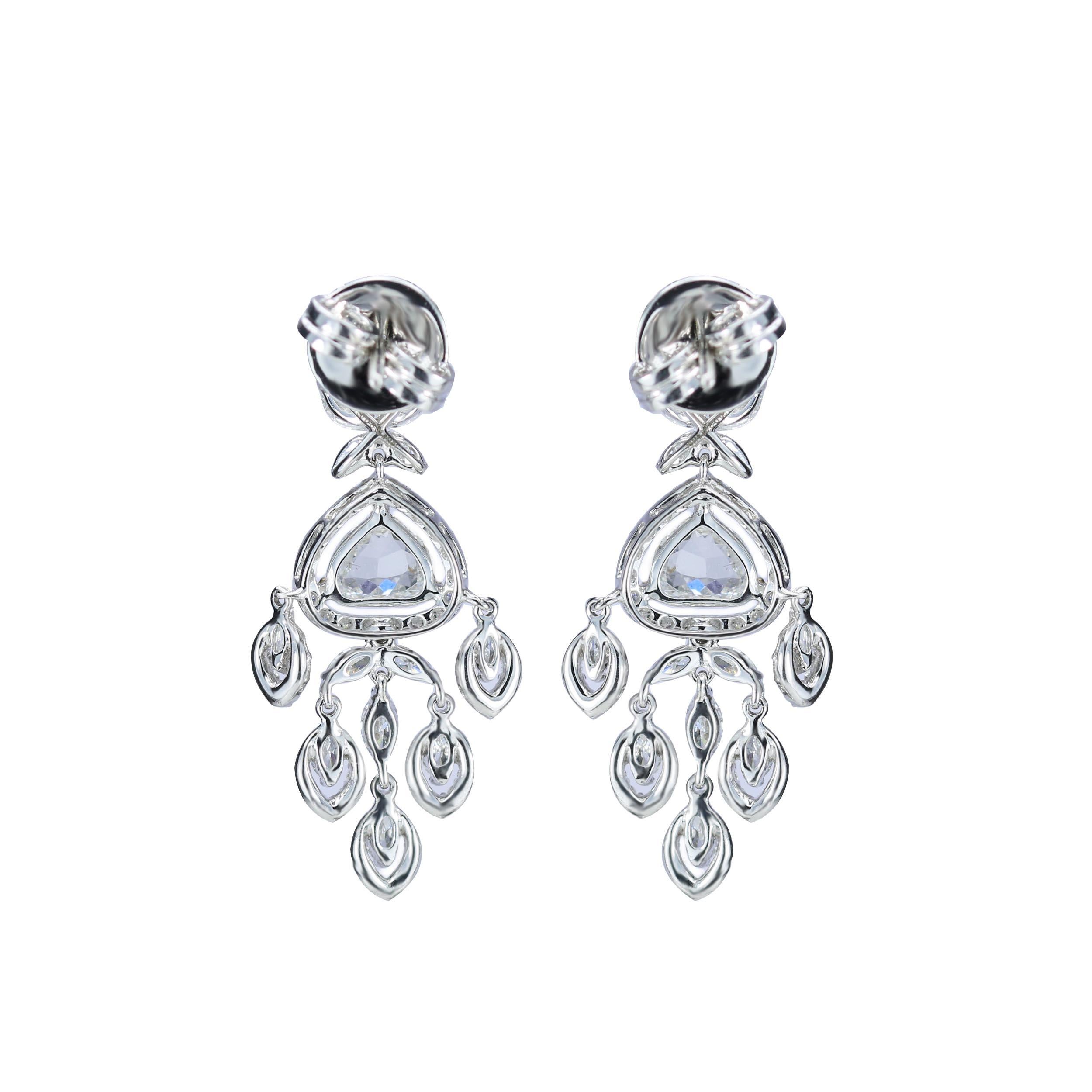 F-G/ VS-SI Marquise cut and Rosecut Diamond earrings

The aesthetic superiority of these art deco-inspired diamond earrings is unmatched. A smattering of F-G/ VS-SI trillion rosecut, brilliant round and marquise diamonds come together in an alluring
