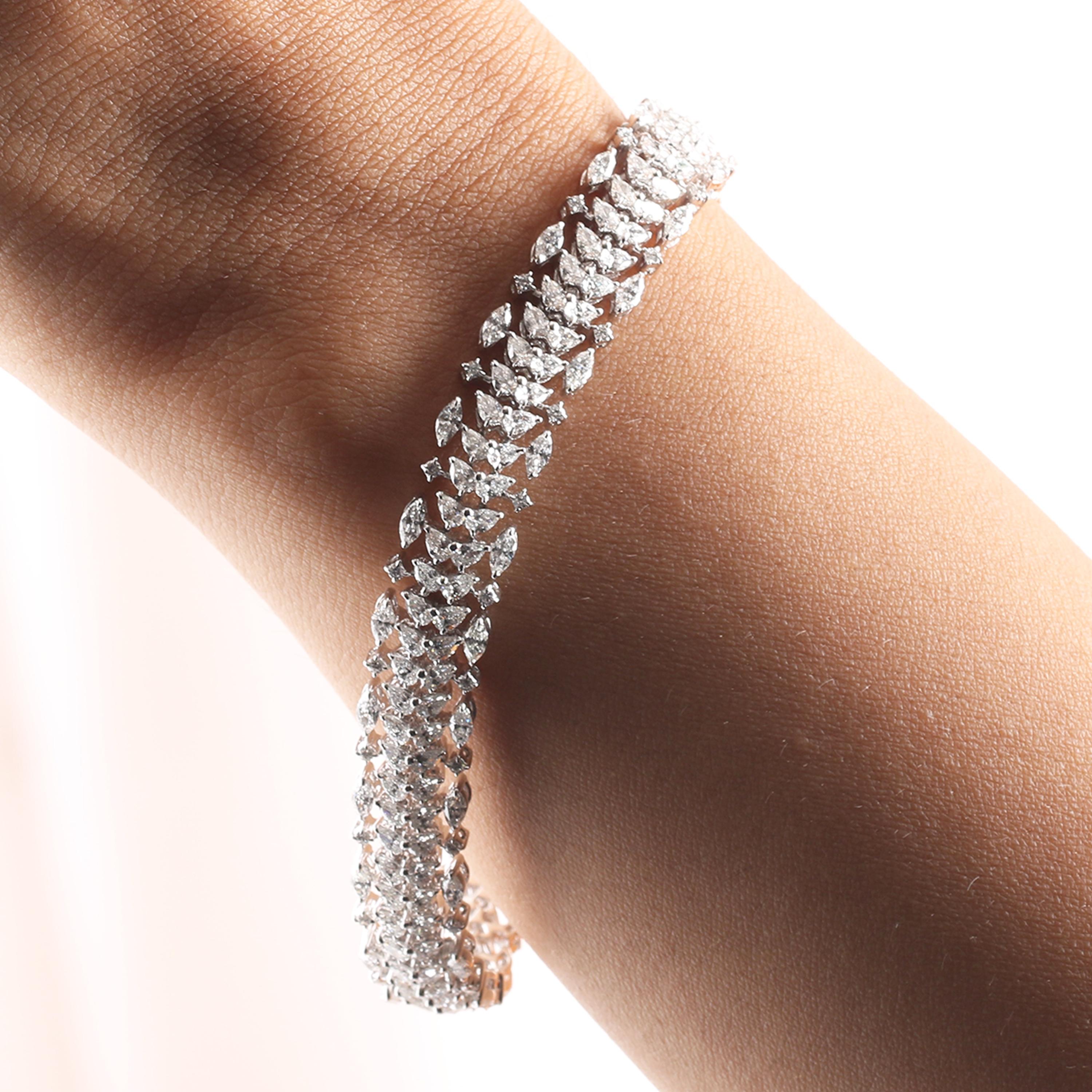 Gross Weight: 29.80 Grams
Diamond Weight: 7.48 cts
Size: 7 Inch (Length of Tennis Bracelet)
IGI Certification can be done on request.

Video of the product can be shared on request.

Featuring 7.48 carats of marquise, pear, and round brilliant cut