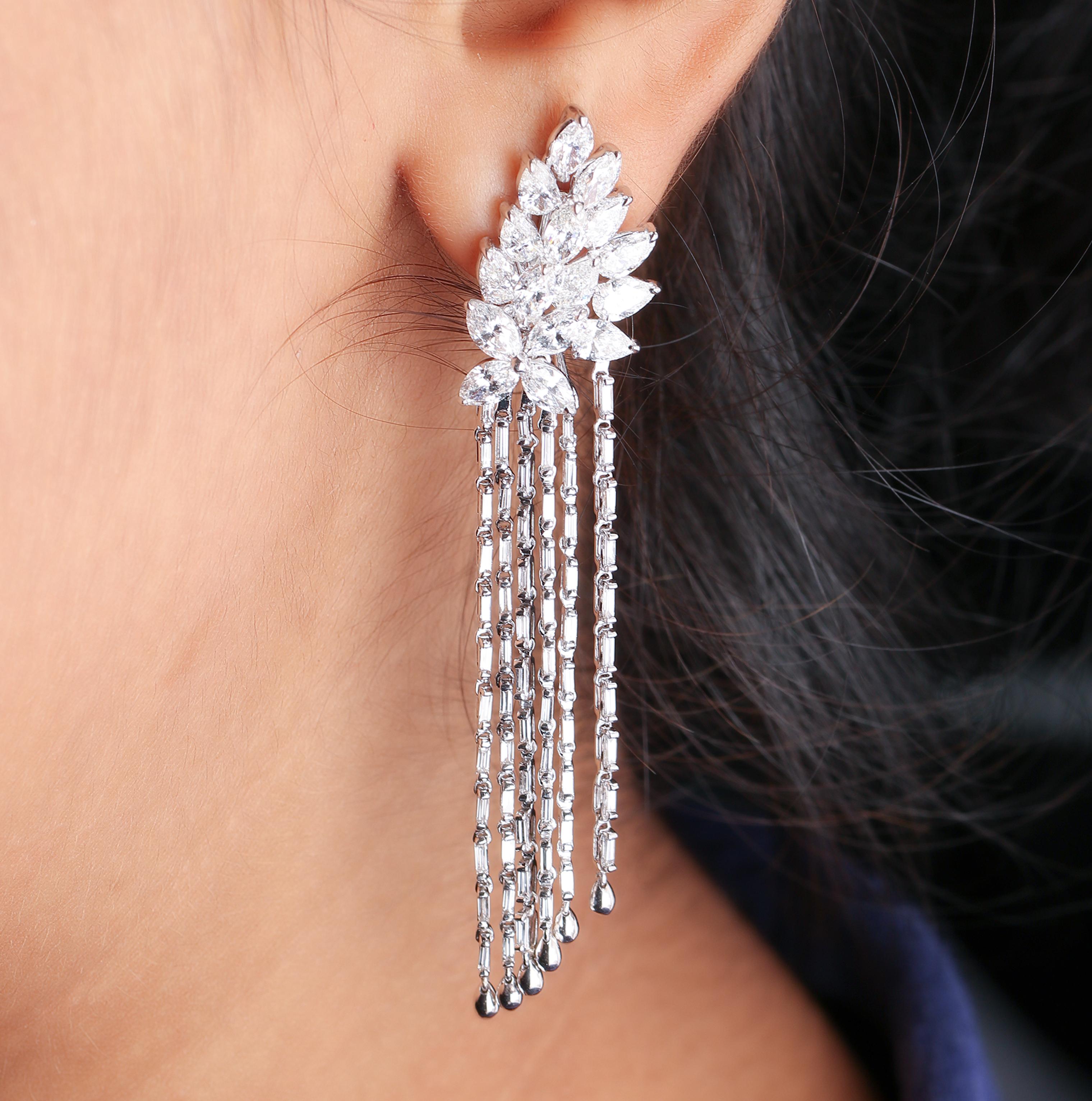 Gross Weight: 19.36 Grams
Diamond Weight: 6.77 Carats
Currently Not Graded. IGI Certification can be done on request.

Video of the product will be shared on request.

Clustered with fancy diamonds-marquise and pears, along with dangling of tapered
