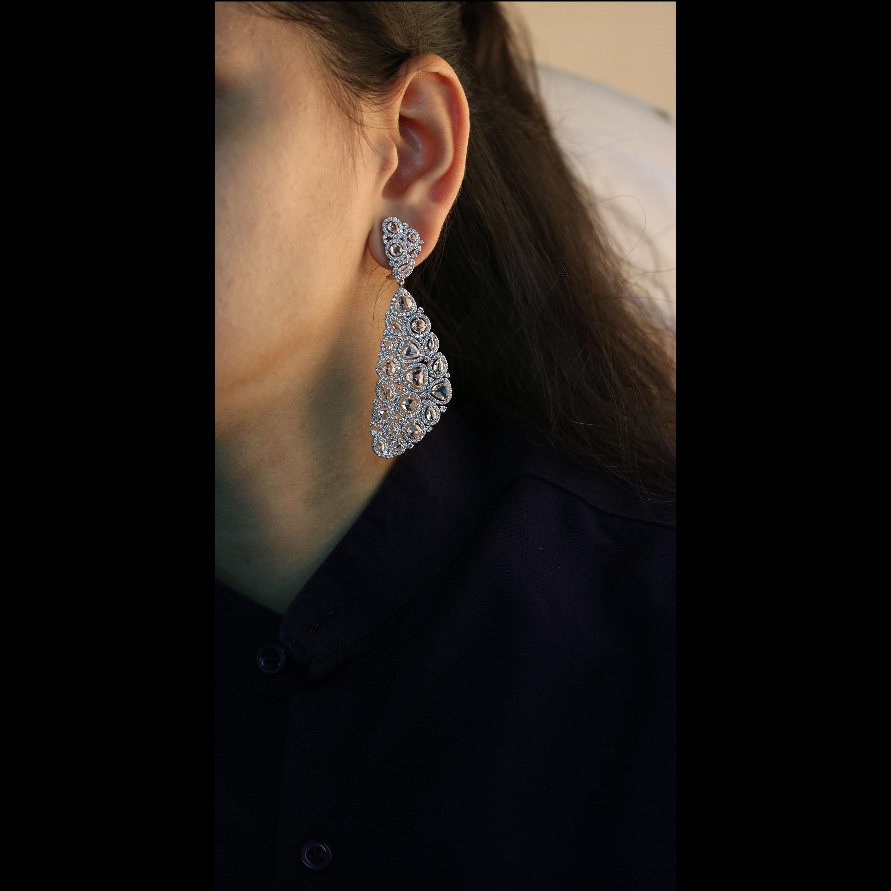 Gross Weight: 32.37 Grams
Diamond Weight: 13.26 cts
IGI Certified:  Summary No: 22J975441807

Celebrating the time-honoured allure of diamonds is this pair of 18K white gold earrings that is generously studded with 720 brilliant cut and rose cut