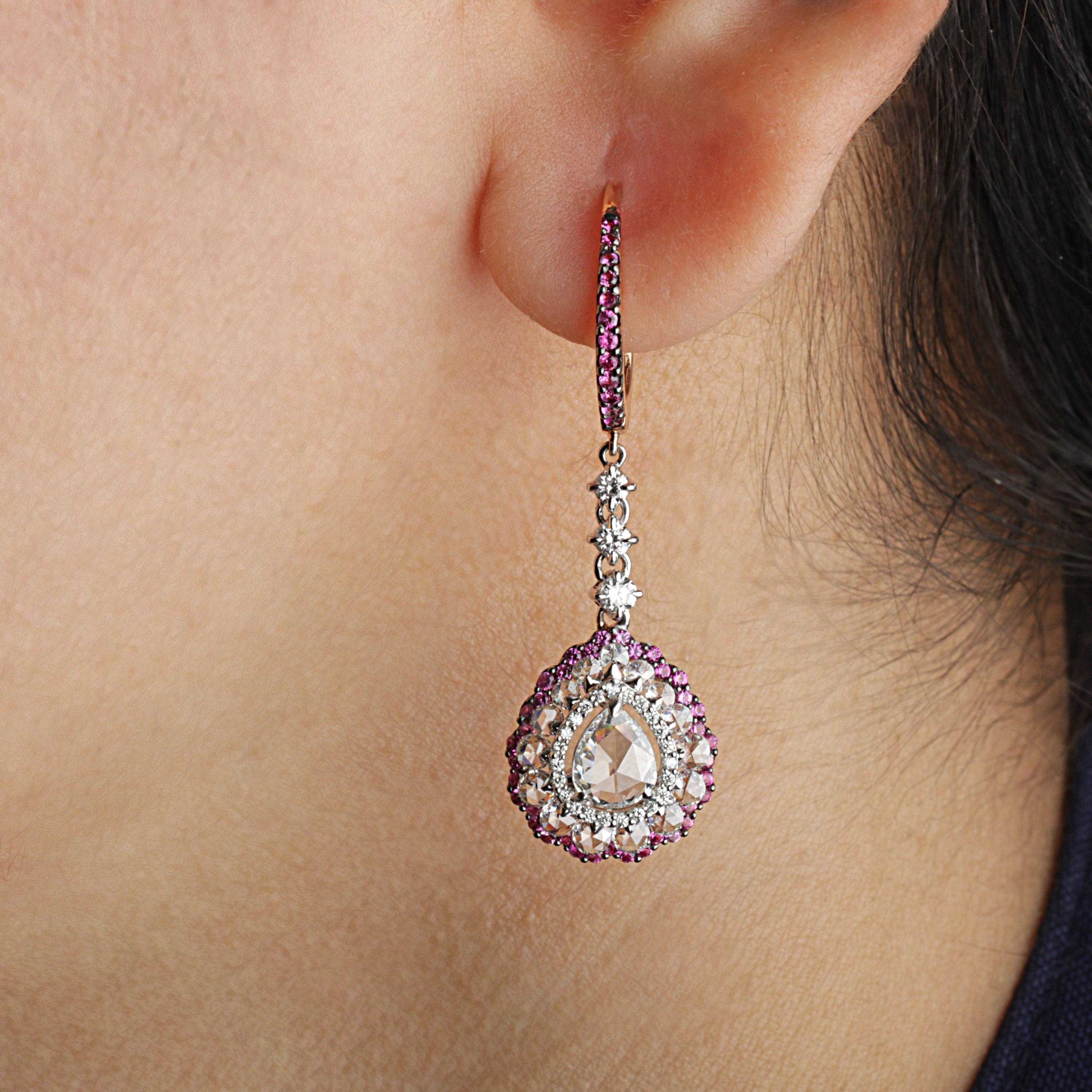 Gross Weight: 5.83 Grams
Diamond Weight: 2.20 Cts
Pink Sapphire Weight: 0.65 cts
IGI Certified: Summary No.: 15J865091903

Video of the product can be shared on Request.

Brilliant and beautiful, these 18K white and rose gold earrings composed with