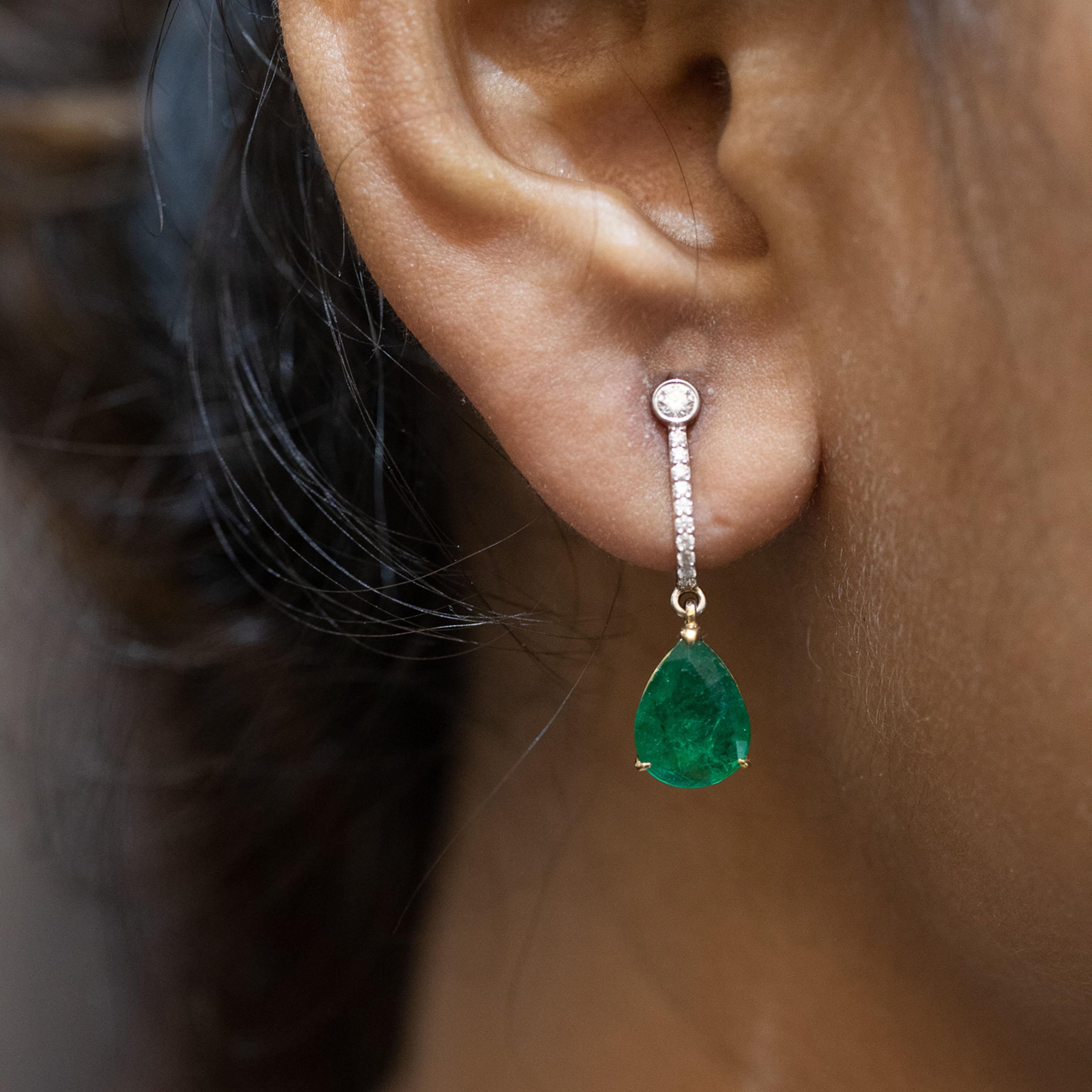 Gross Weight: 5.41 Grams
Diamond Weight: 0.29 cts
Emerald Weight: 6.07 cts
IGI Certification can be done on request.

Video of the product can be shared on request.

Dangling on diamond studded links, these pear shaped emeralds mirror the depths and