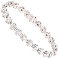 Studio Rêves Floral Tapered Baguette Diamond Tennis Bracelet in 18 Karat Gold