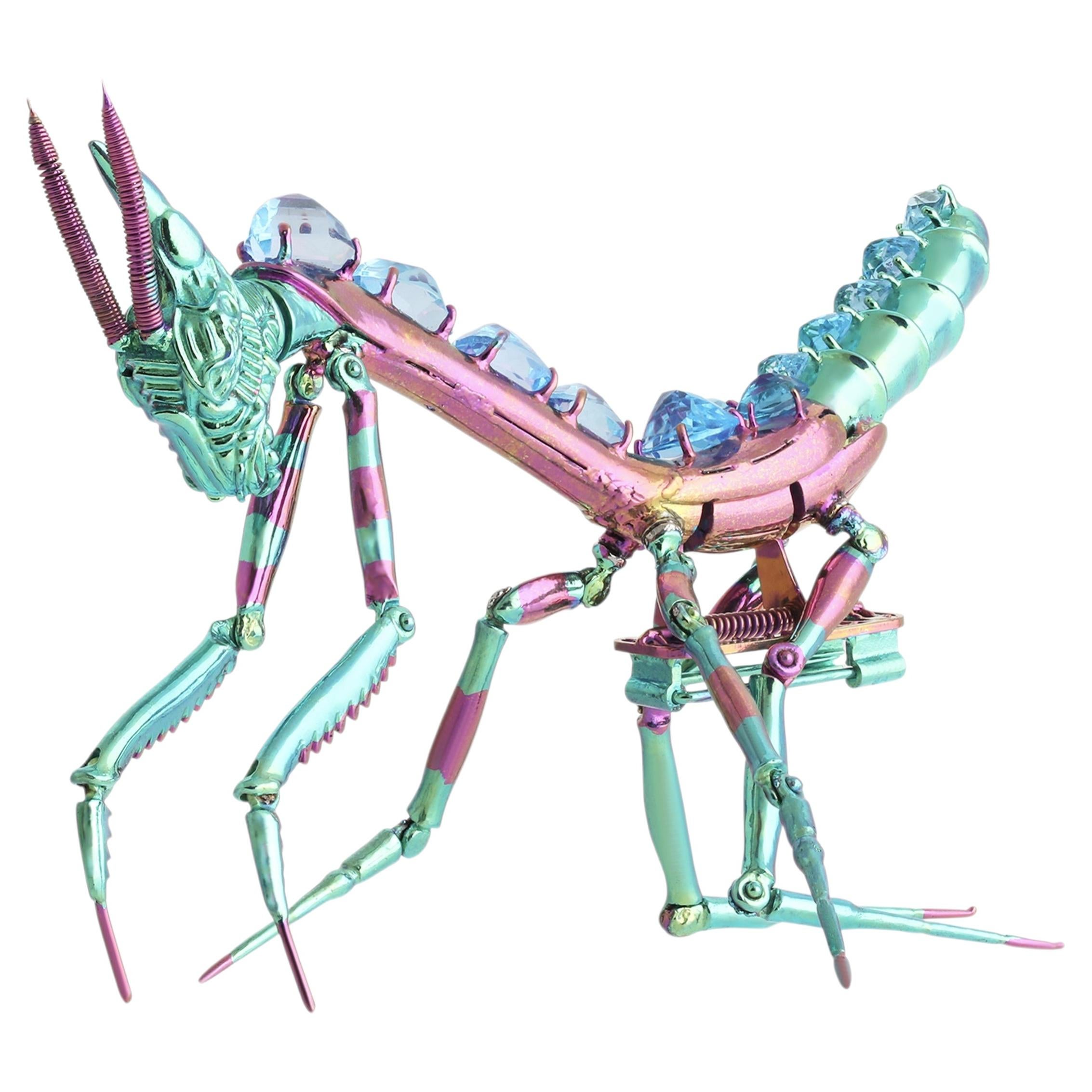 Titanium Mantis Studio Rêves Iridescent Praying Mantis Blue Topaz Brooch in Titanium ...