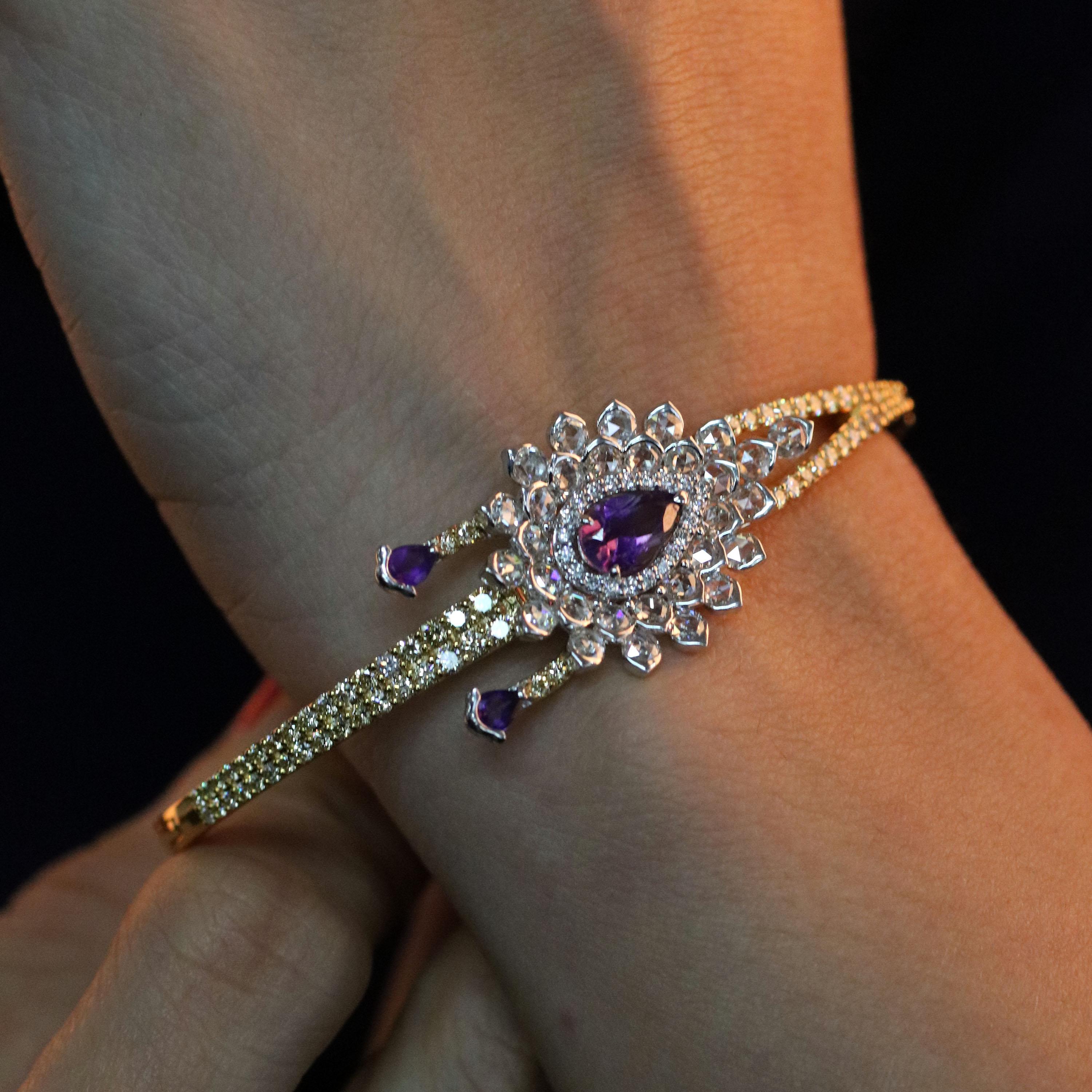 Gross Weight: 19.45 Grams
Diamond Weight: 2.89 cts
Amethyst Weight: 0.95 cts
Bracelet Size: 56.00 MM X 46.10 MM
IGI Certification can be done on Request.

Video of the product can be shared on request.

Openable Bracelet fabricated in 18 karat white
