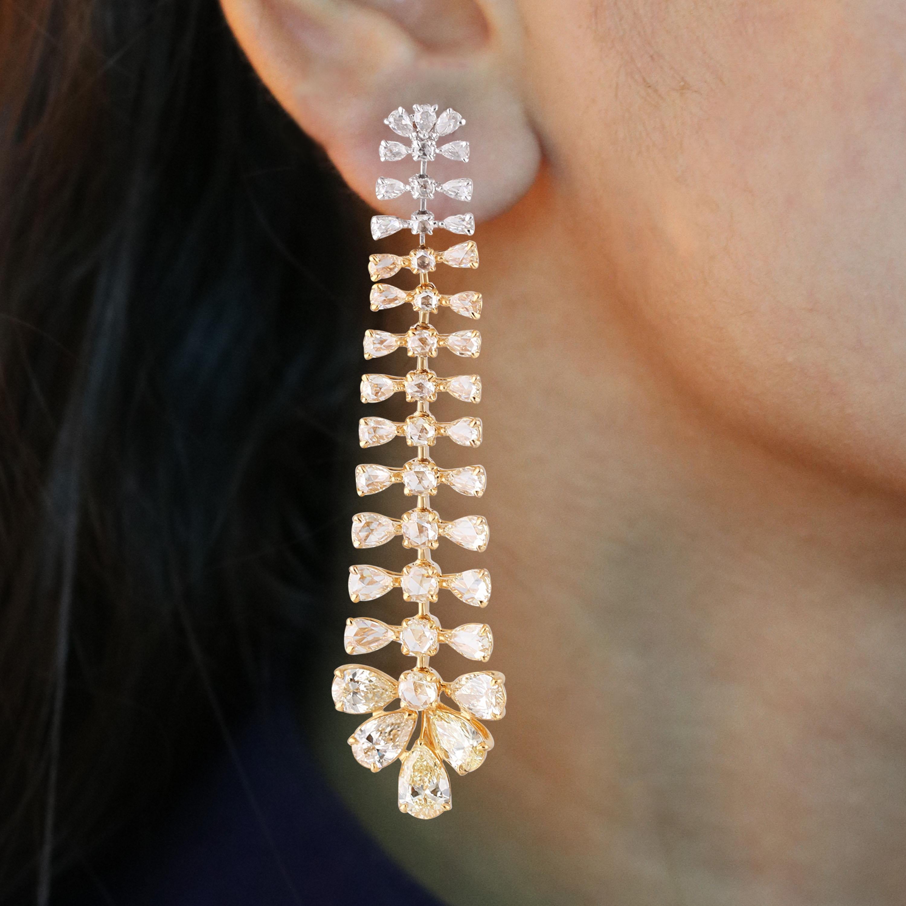Gross Weight: 18.40 Grams
Diamond Weight: 8.04 cts
IGI Certification can be done on request.

Videos can be done on request.

Keeping it simple, never looked as elegant as this pair of 18K white and yellow gold earrings adorned with white and yellow