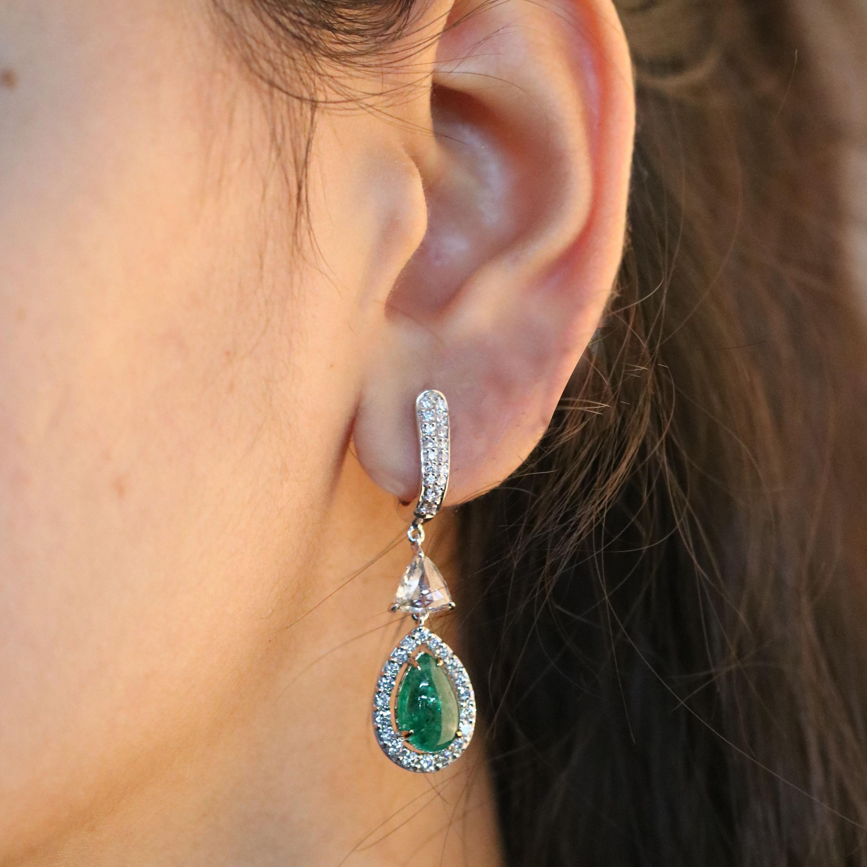 Gross Weight: 7.17 Grams
Diamond Weight: 2.49 cts
Emerald Weight: 4.42 cts
IGI Certificate: 31J857171811

Video of the product can be shared on request.

Keeping it simple never looked as elegant as this pair of 18K white gold drop earrings adorned
