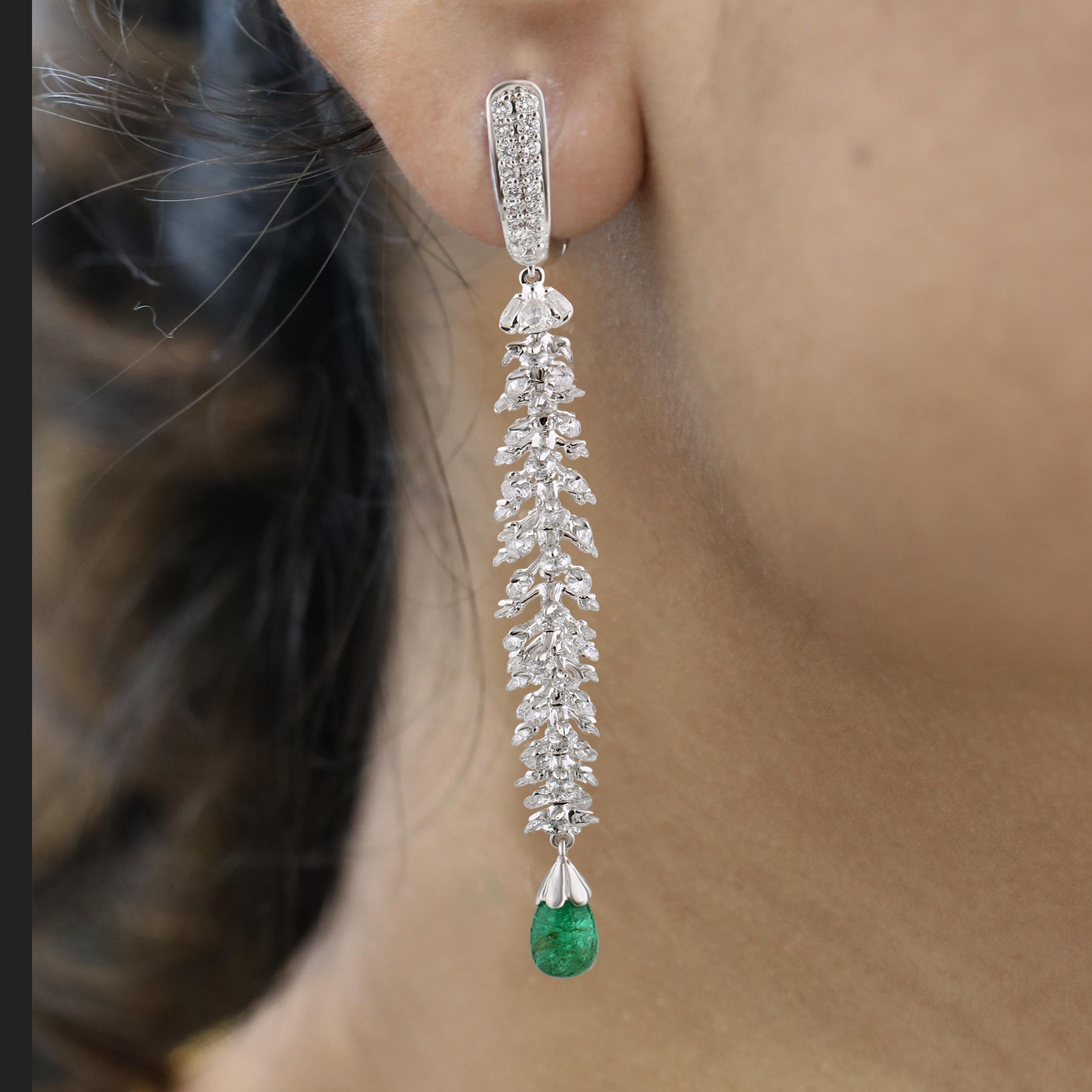 Gross Weight: 10.53 Grams
Diamond Weight: 4.52 cts
Emerald Weight: 2.95 cts
IGI Certification can be done on request

Video of the product can be shared on request.

The simplicity and elegance of a sleek pair of danglers is embodied by this