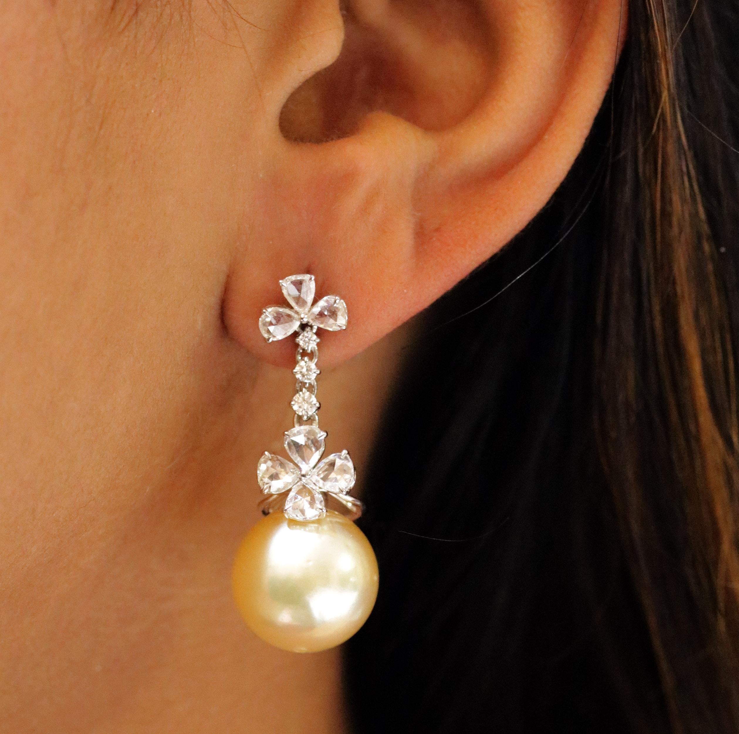 Gross Weight: 13.83 Grams
Diamond Weight: 2.30 cts
Pearl Weight: 37.60 cts
IGI Certified: Summary No: 31J857111811

Video of the product can be shared on request.

Feminine and classy, this pair of 18K white gold earrings featuring pear rose cut and