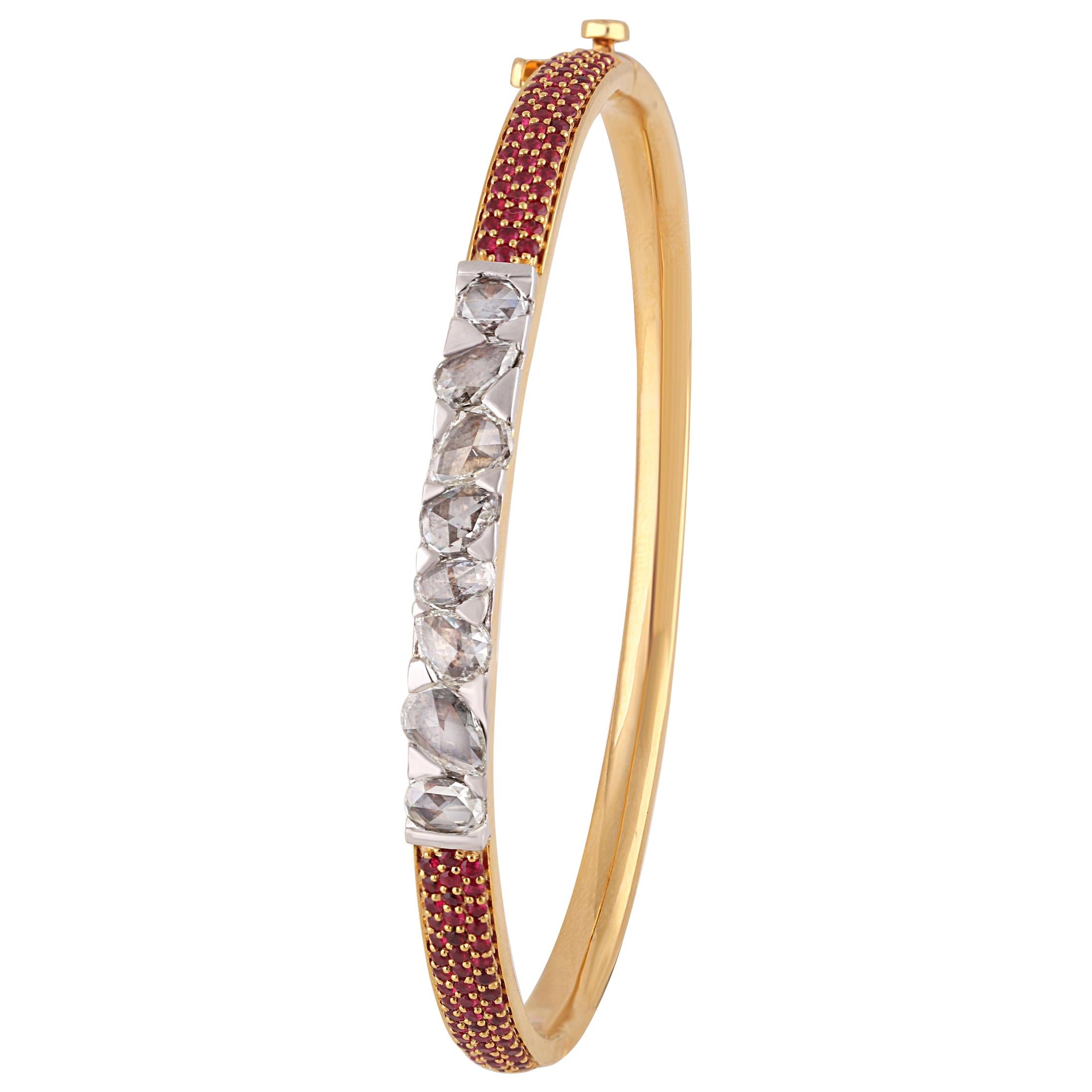 Gross Weight: 17.18 Grams
Diamond Weight: 1.63 cts
Ruby Weight: 1.04 cts
Bracelet Size: 56.20 MM X 45.70 MM
IGI Certification can be done on Request.

Video of the product can be shared on request.

Exemplifying the charm of simplicity, is this 18