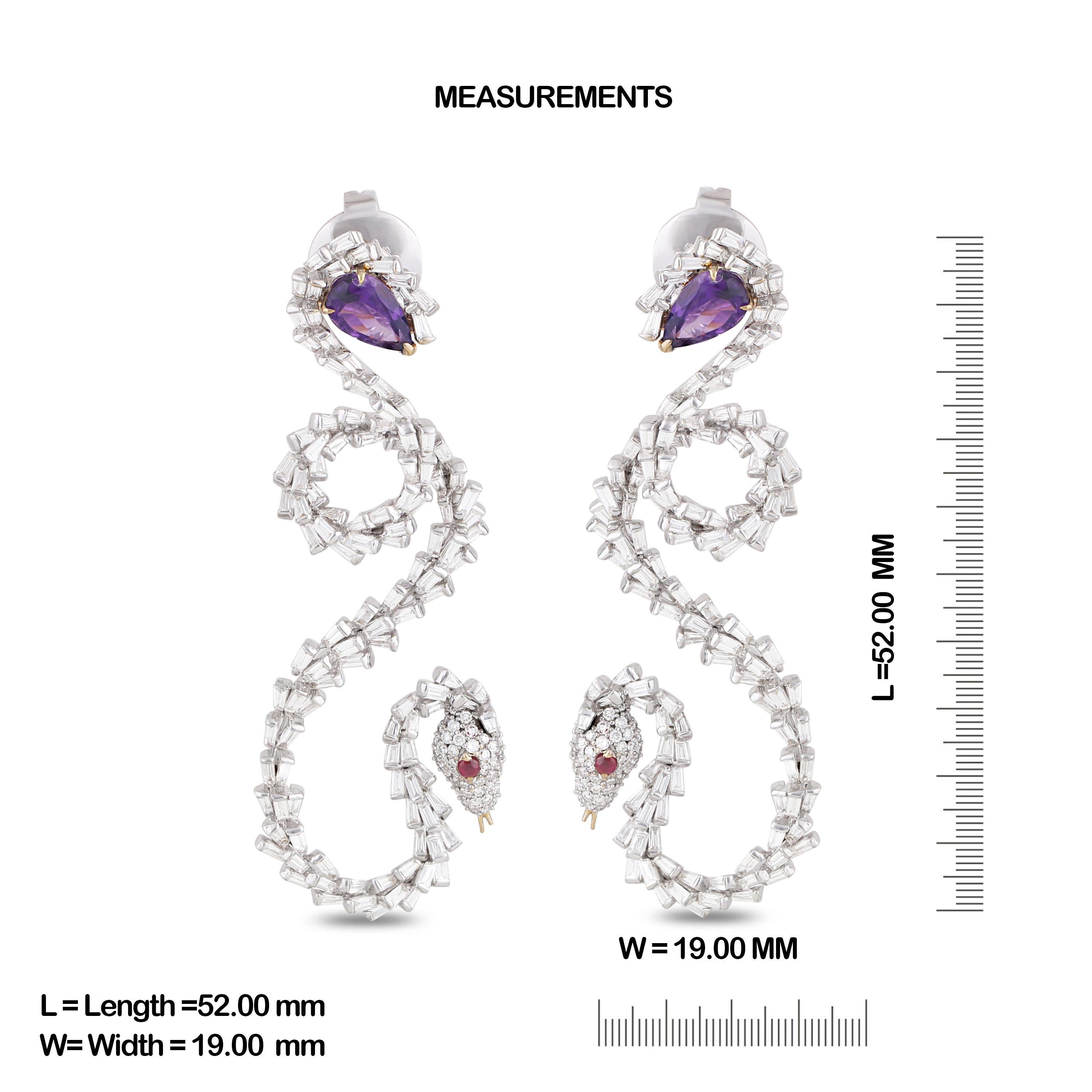 Gross Weight: 16.34 Grams
Diamond Weight: 4.18 cts
Amethyst Weight: 1.35 cts
Ruby Weight: 0.06 cts
IGI Certification can be done on request.

Video of the product can be shared on request

This pair of earring is inspirational design of a