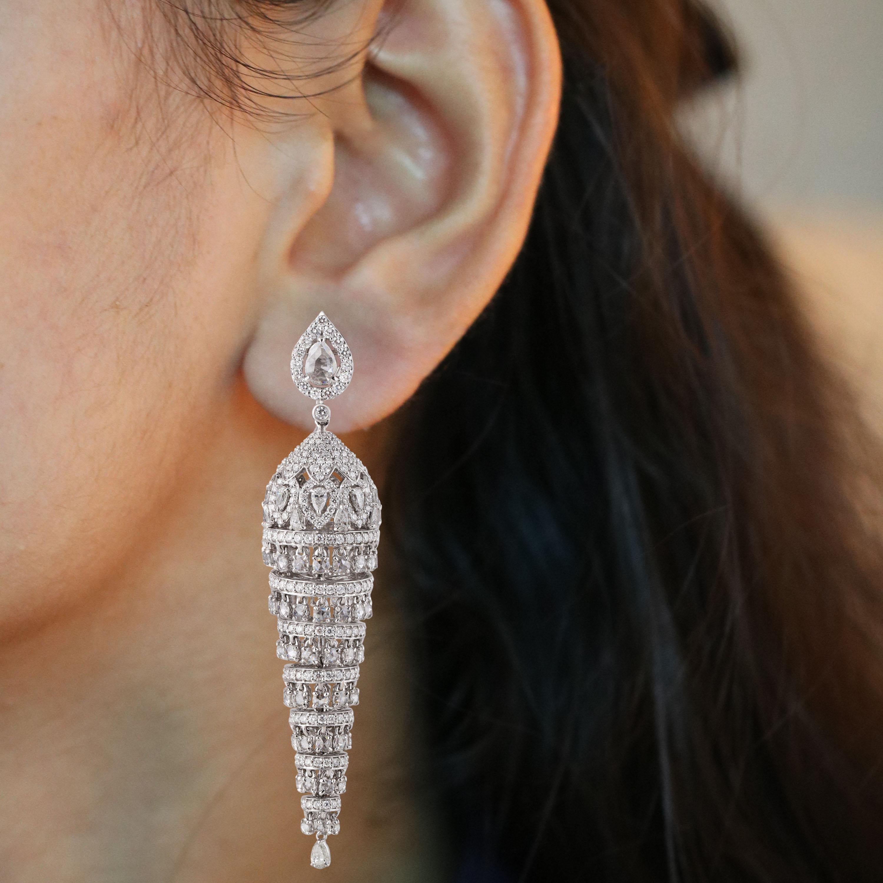 Gross Weight: 42.53 Grams
Diamond Weight: 13.67 cts
IGI Certified: Summary No.: 32J177781911

Video of the product can be shared upon request.

The whorls of these diamond chandelier earrings draw you in like a tornado. 8 tiers of round brilliant