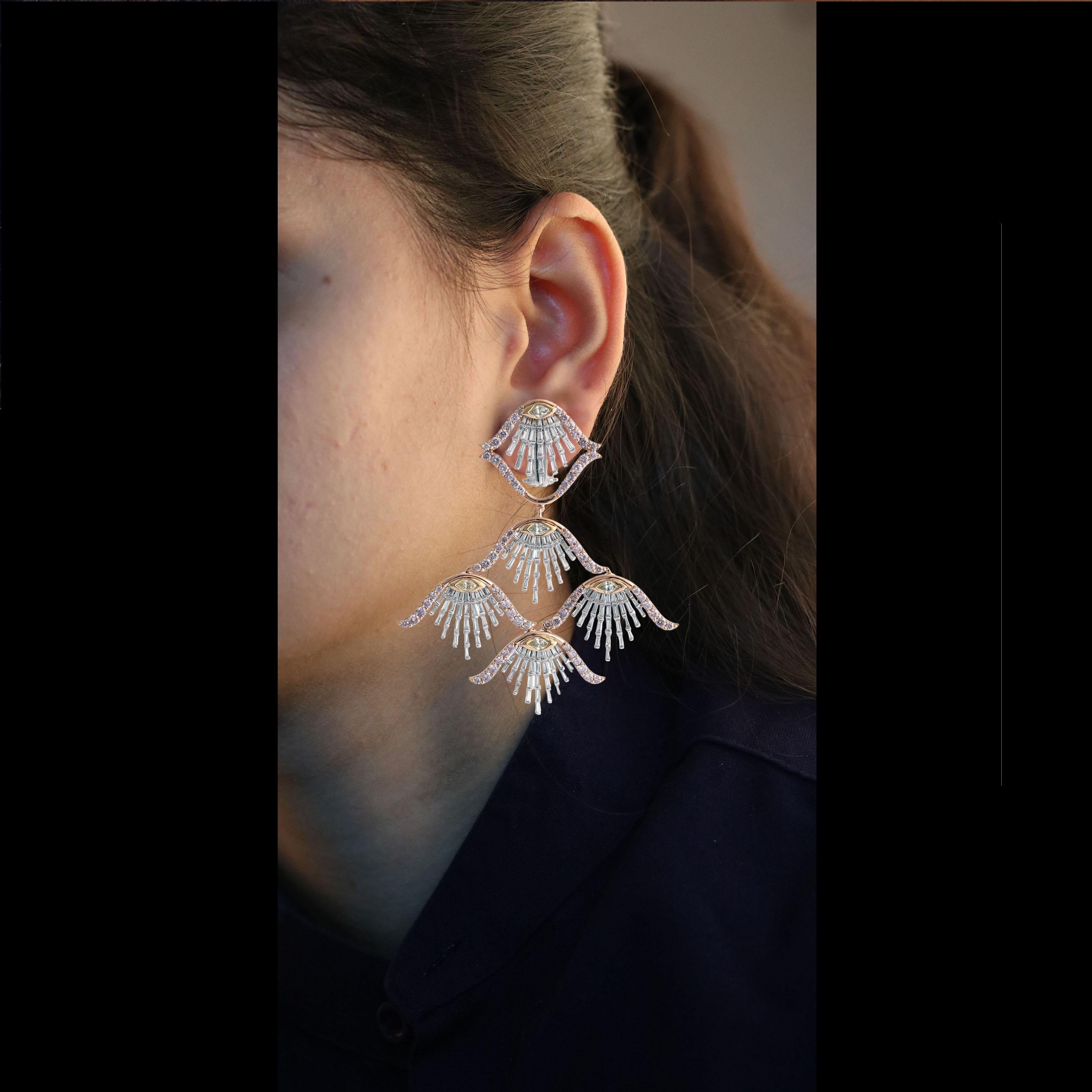 Gross Weight: 32.59 Grams
Diamond Weight: 7.65 Carats
Currently Not Graded. IGI Certification can be done on request.

More videos and photos can be shared on request.

These pair of dangling earrings are inspired by the seashells. Exquisite