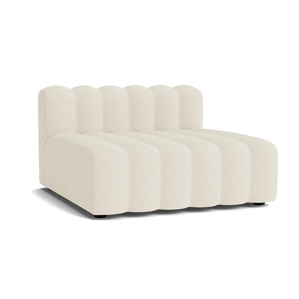 Studio Setup 10 Sofa by NORR11
Dimensions: D 130 x W 426 x H 70 cm. SH 47 cm. 
Materials: Foam, wood and upholstery.
Upholstery: Barnum Boucle Color 24.

Available in different upholstery options. Prices may vary. A plywood structure with elastic