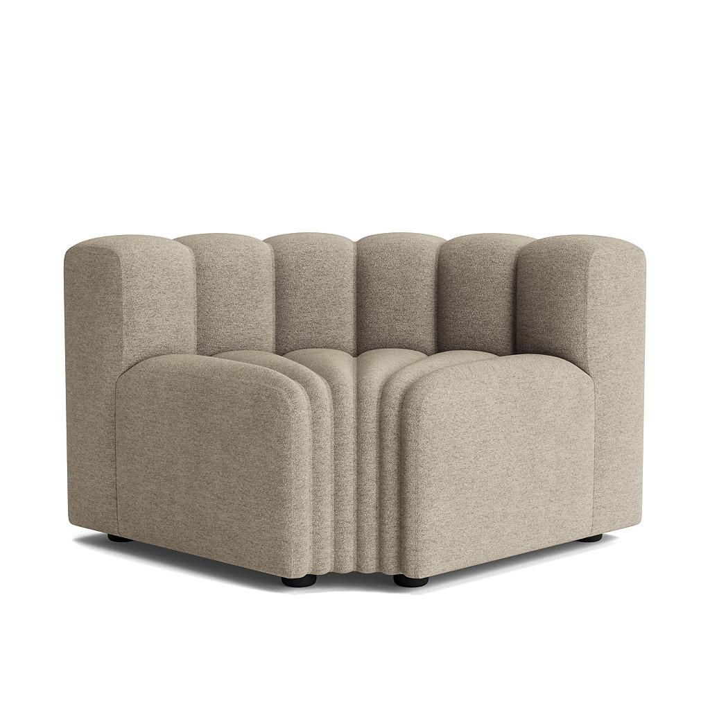 Studio Setup 7 Sofa by NORR11
Dimensions: D 250 x W 250 x H 70 cm. SH 47 cm. 
Materials: Foam, wood and upholstery.
Upholstery: Barnum Boucle Color 3.

Available in different upholstery options. Prices may vary. A plywood structure with elastic
