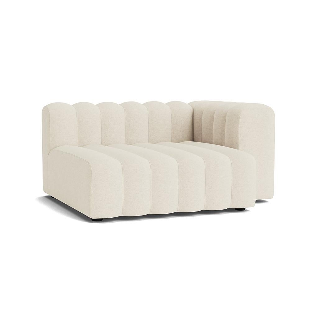 Studio Setup 9 Sofa by NORR11
Dimensions: D 302 x W 343 x H 70 cm. SH 47 cm. 
Materials: Foam, wood and upholstery.
Upholstery: Barnum Boucle Color 24.

Available in different upholstery options. Prices may vary. A plywood structure with elastic