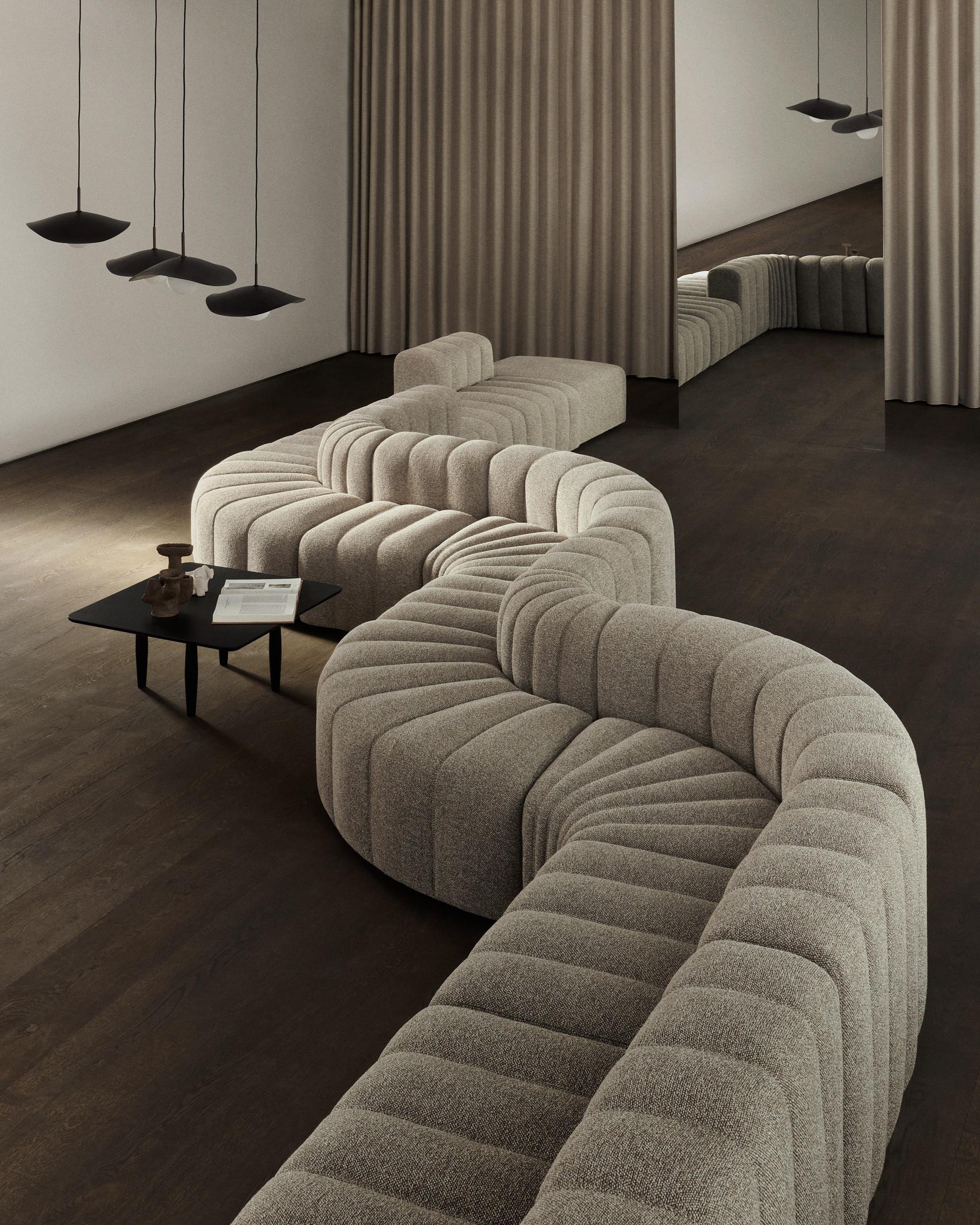 Studio sofa by Kristian Sofus Hansen & Tommy Hyldahl for Nor11.

Measures: Setup 8 modules : 1 large, 1 medium, 1 small, 2 curve, 1 corner, 1 ottoman, 2 armrest) 
W. 406 cm / D. 400 cm / H. 70cm / Seating H. 42cm.

Model shown: Barnum bouclé