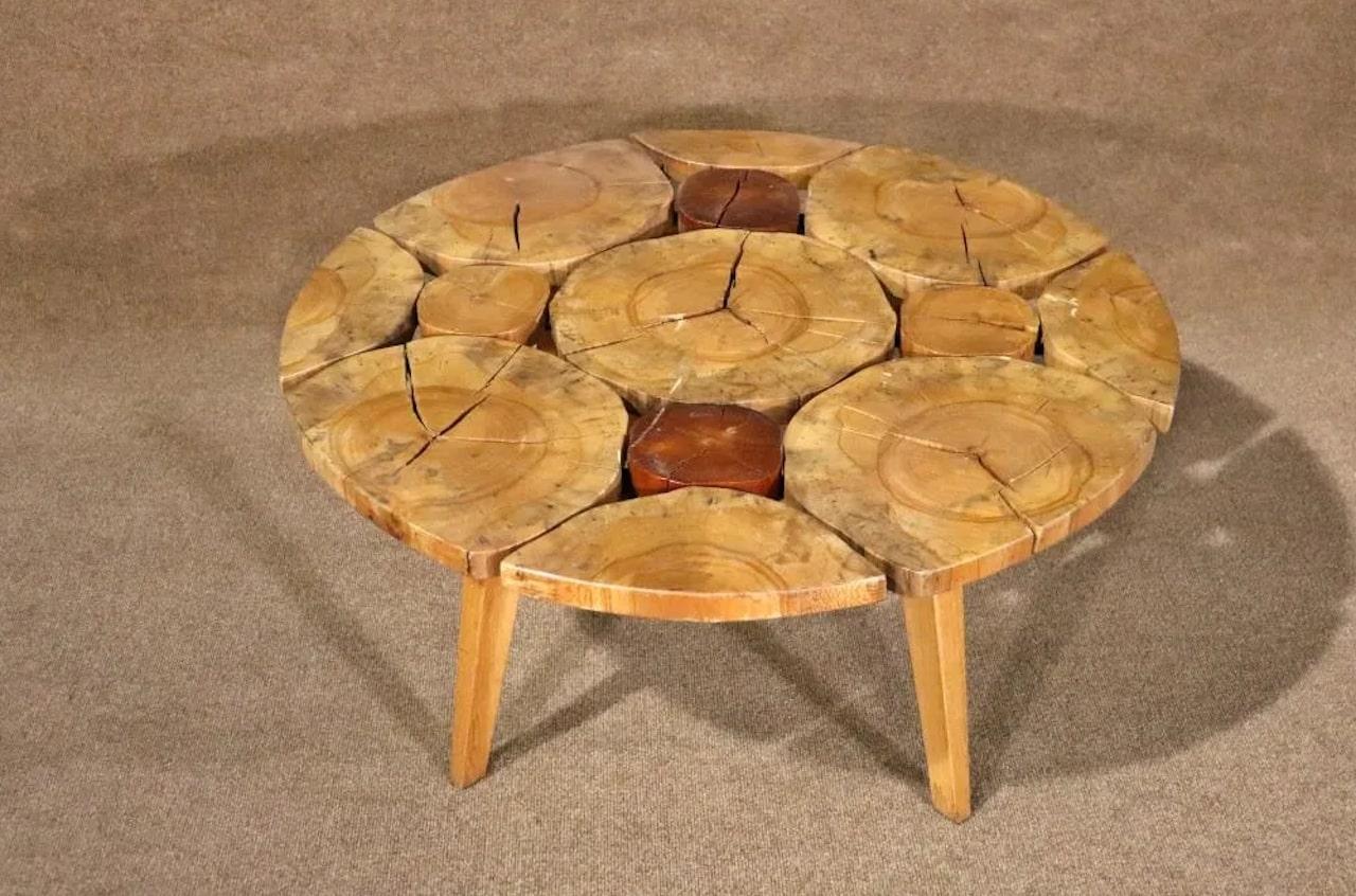 Unique free- form coffee table featuring a collage-top made up of off-cuts. This piece will make a great addition to any modern home or office area. 
Please confirm item pickup location (Brooklyn, NY or Wall, NJ) with dealer.