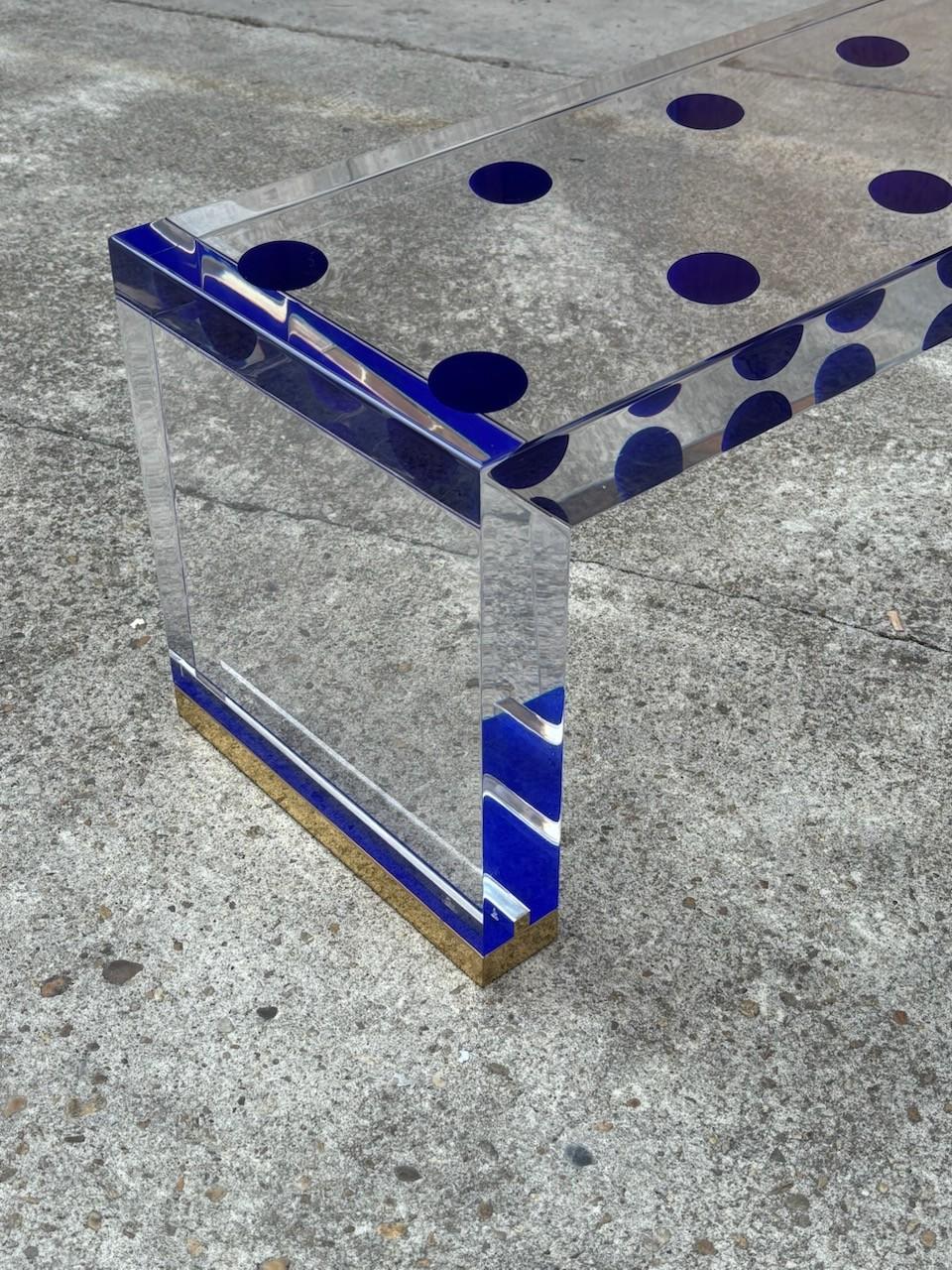 Coffee table.
Brass base and plexiglass top with agate slides insertions. Designed by Studio Superego.

2018

cm 136 x 55  H 47

Rectangular coffee table designed by Milanese Studio Superego, made in multi-color and transparent plexiglass with seven