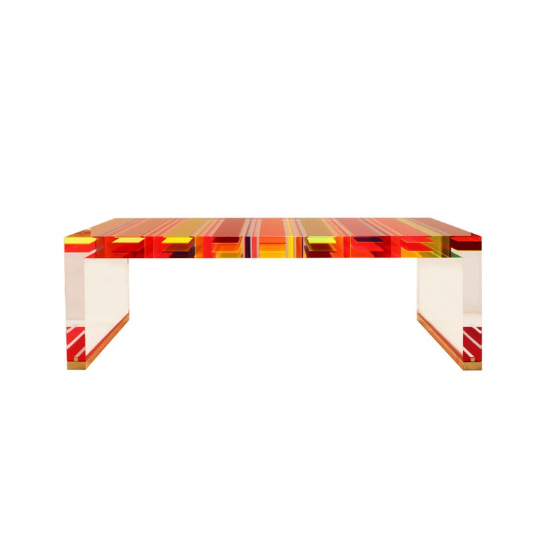 Rectangular coffee table designed by Milanese Studio Superego, made in multi-color and transparent plexiglass with seven centimetres thickness and feet of the legs finished in brass.

Our main target is customer satisfaction, so we include in the