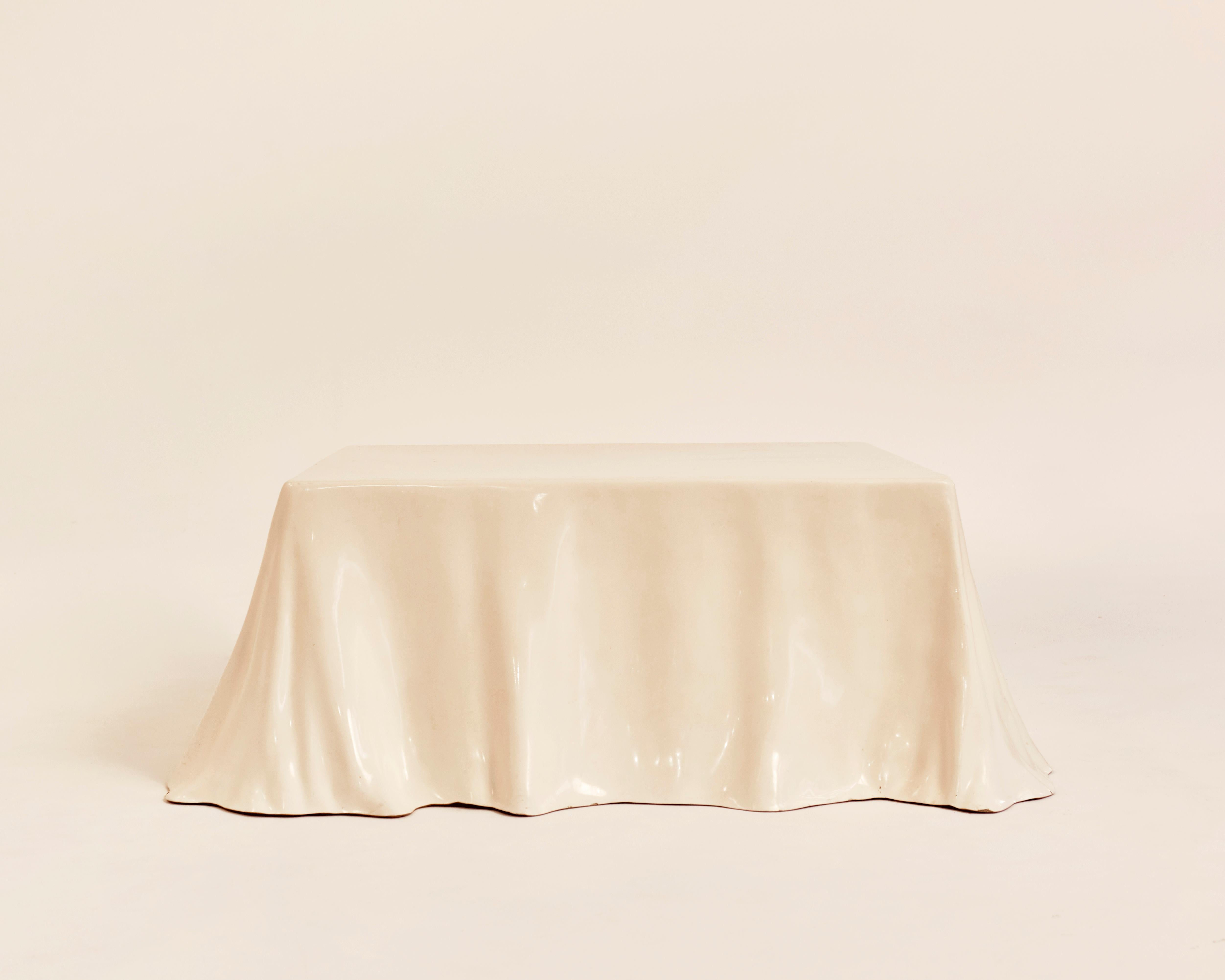 Italy, 1969. Very Rare. Produced in limited quantities. Imported into the USA by Stendig. Crafted from gel-coated fiberglass molded to emulate draped fabric, a nod to the name Tovaglia. 