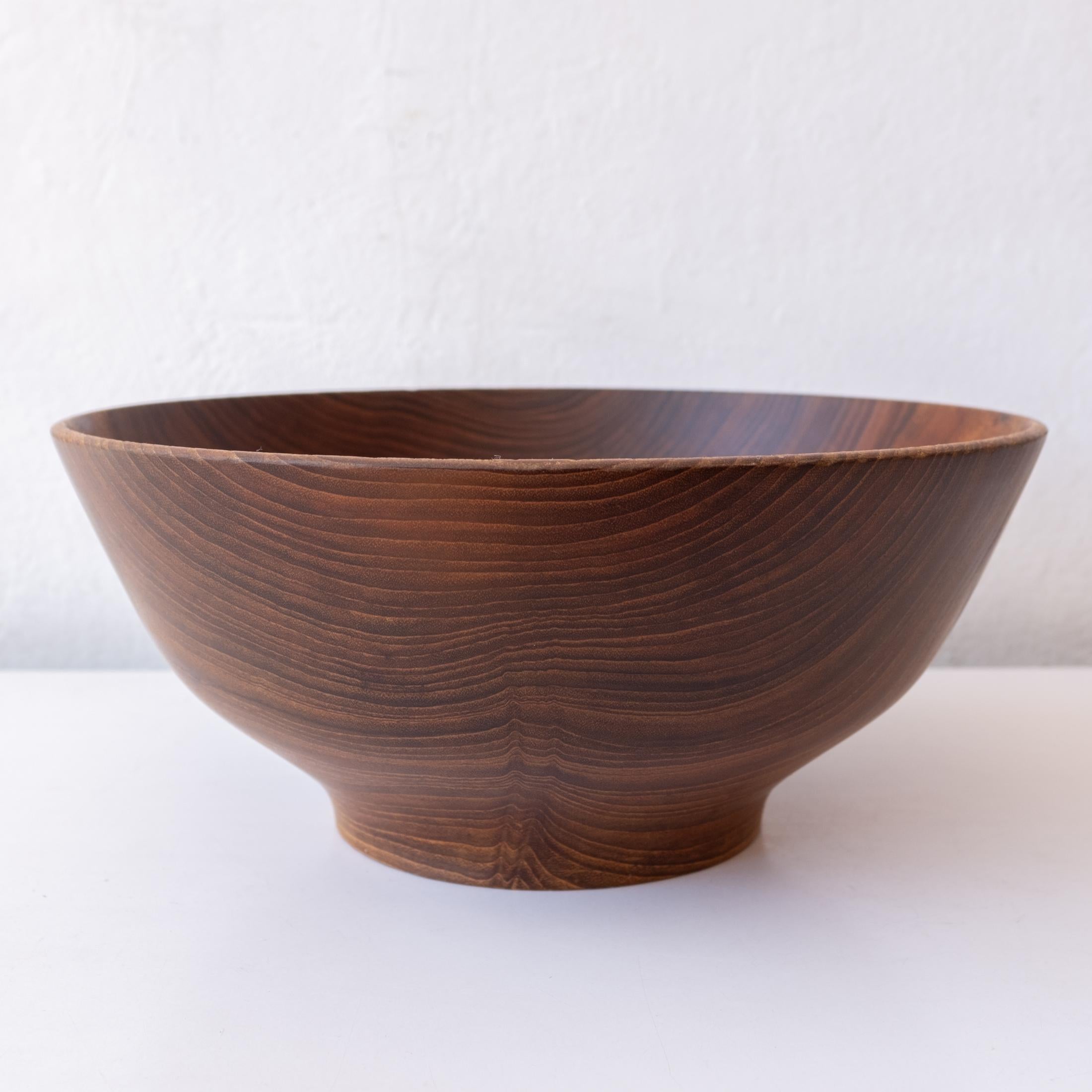  Footed bowl by legendary craftsman Bob Stocksdale. Beautiful grain. Signed on the bottom. 

Stocksdale was one of the earliest members of ACCI - the Arts and Crafts Cooperative, Inc. on Shattuck Avenue in Berkeley, CA.

Bob Stocksdale (1913 —