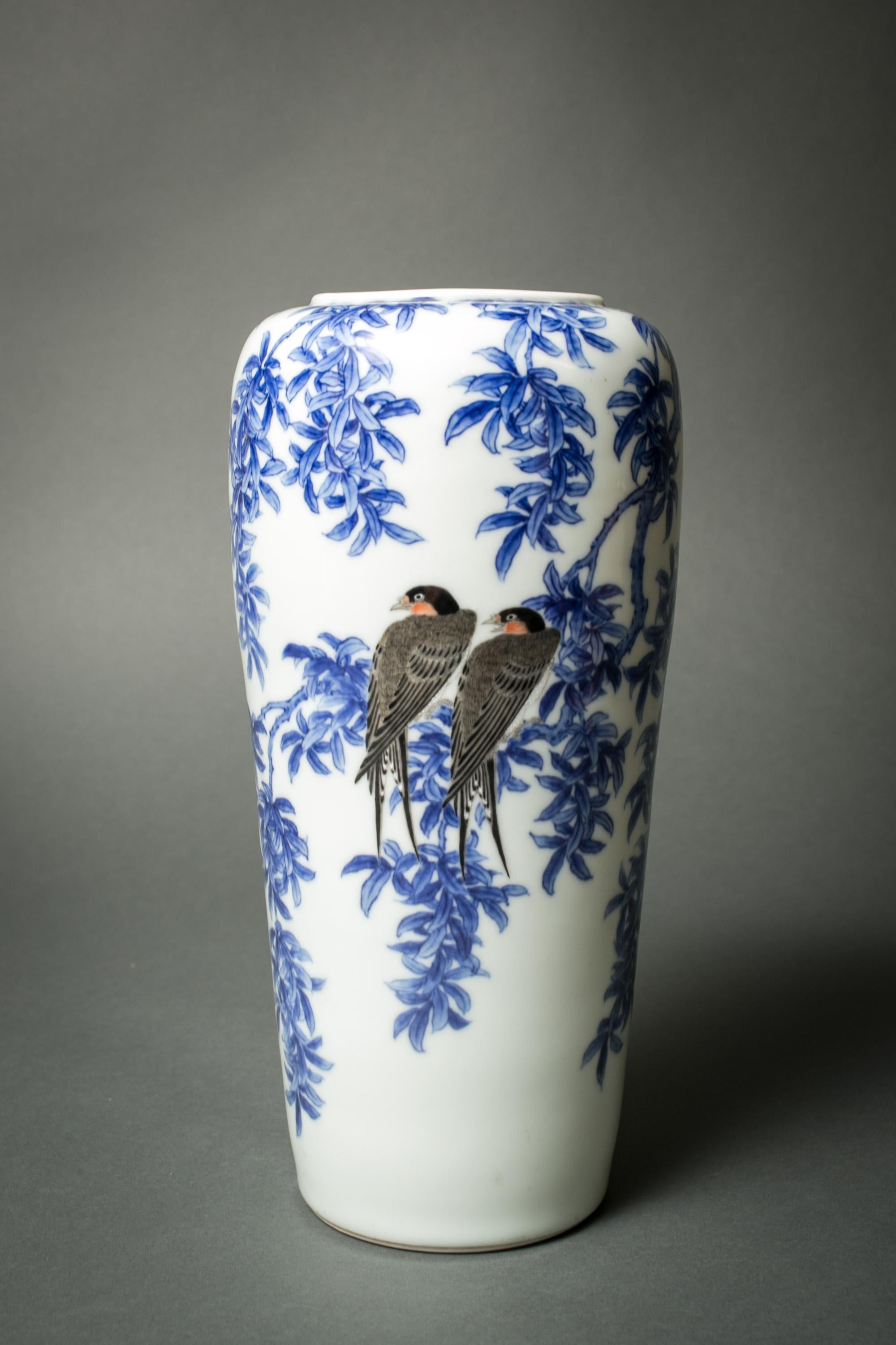 Meiji period (1868 -1912) ceramic vase with beautiful hand painted tree and intricate rendering of swallows. Comes with original signed box. Signature on bottom.