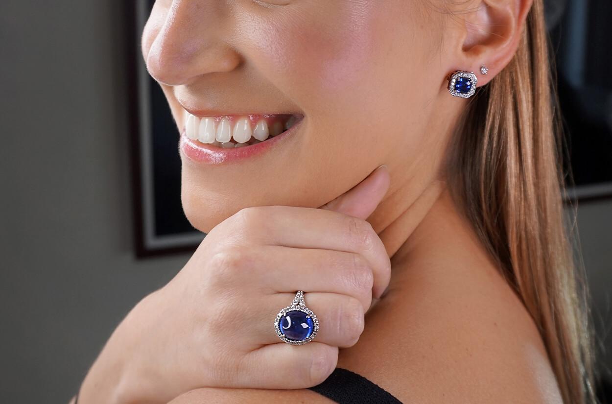Absolutely stunning in their simplicity, these exquisite stud earrings feature captivating sapphires cradled in a bed of 18kt white gold. Glistening diamonds embrace the sapphires, adding a touch of brilliance and allure to these timeless pieces of