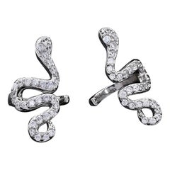 Orecchini con borchie Orecchini in argento 925 con design a serpente con pavé di diamanti naturali