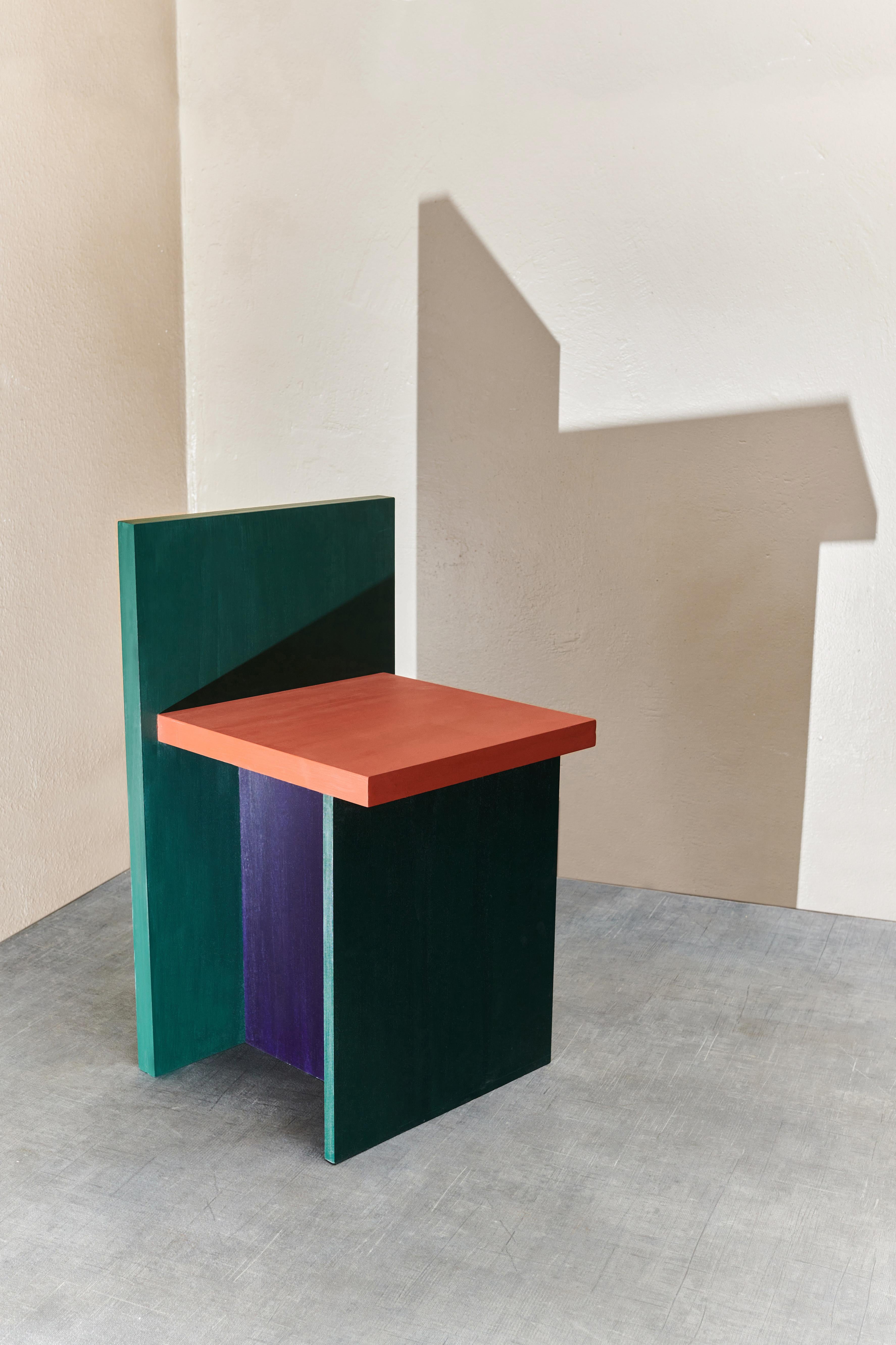 Study of space chair by Dechem Studio.
Dimensions: D 45 x W 45 x H 75 cm.
Materials: wood.

Based on the Study of Space paintings the simple wooden chair allows a further investigation into how to accentuate space by the use of colour. Its