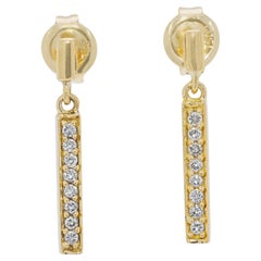 Boucles d'oreilles pendantes en or jaune 18 carats avec diamant naturel de 0,11 ct.