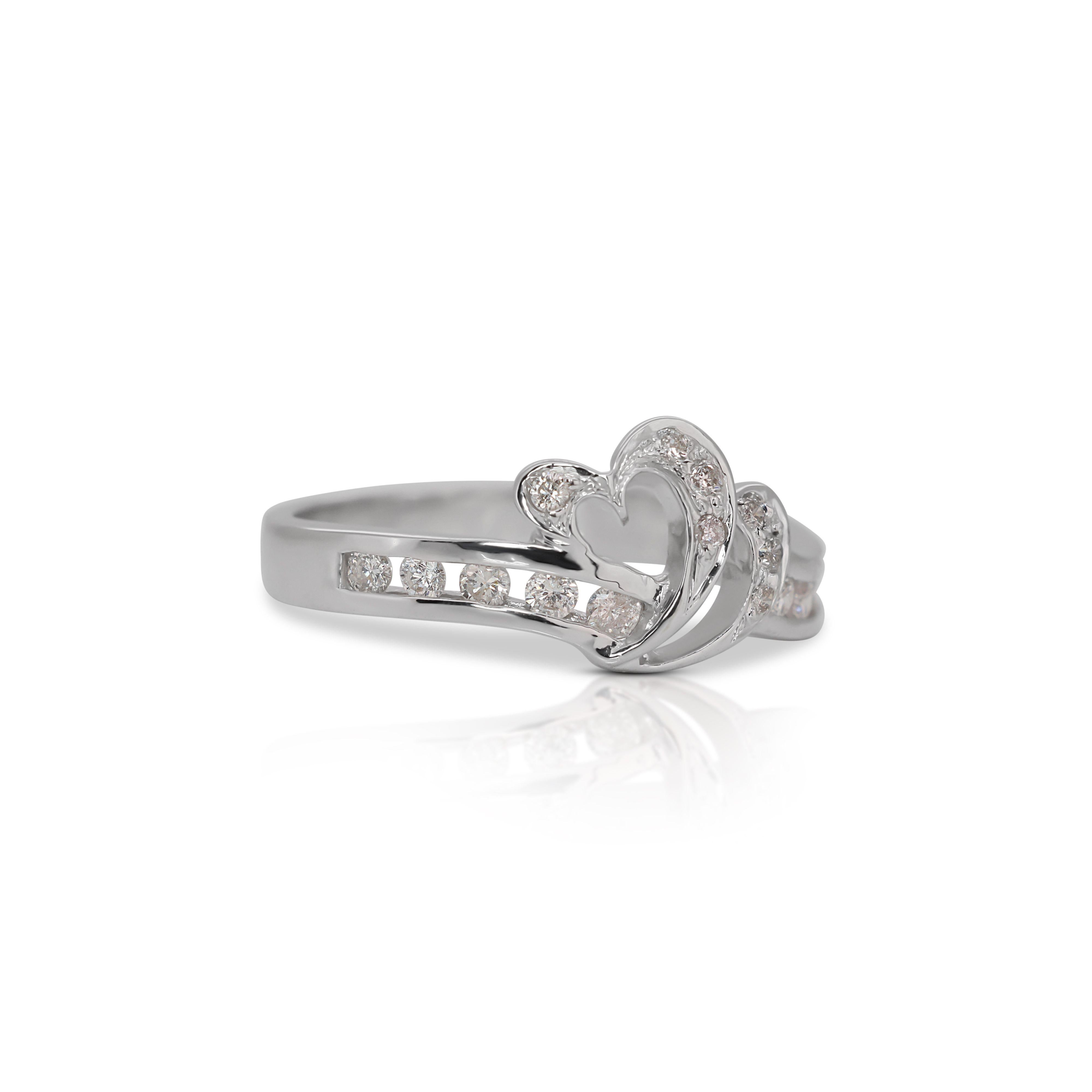 This Stunning Heart-shaped Diamond Ring is a symbol of love and devotion, perfect for marking special occasions, such as engagements, anniversaries, or as a heartfelt gift. Its design exudes classic beauty and complements a wide range of styles,
