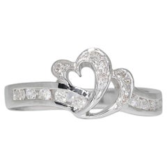 Stupendo anello con diamante a forma di cuore da 0,25 carati