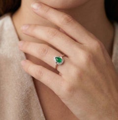 Stunning 0.34ct Emerald & Diamond Halo Ring in 18K White Gold