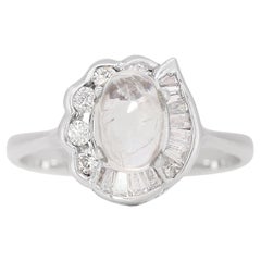 Superbe bague en pierre de lune de 0,60 carat avec diamants latéraux