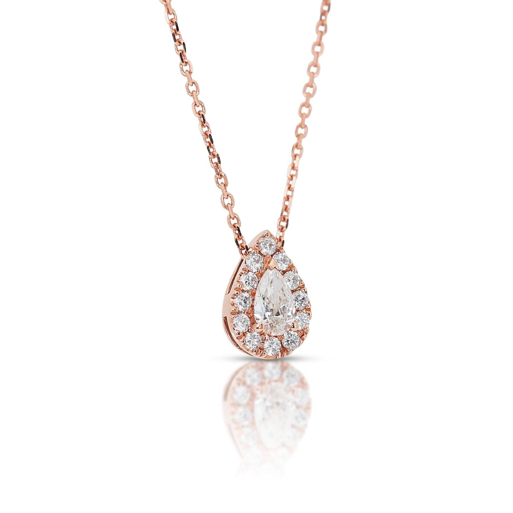 Splendida collana aureola con diamanti da 0,63 carati e ciondolo in oro rosa 14k - Certificato GIA

Questa sofisticata collana in oro rosa 14k con ciondolo presenta uno splendido diamante a forma di pera da 0,51 carati al centro. Accentuato da 12