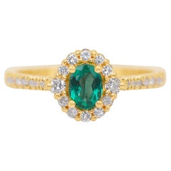Stunning 0.67ct Emerald and Natural Diamonds Pave Ring in 18k Yellow Gold Stunning 0.67ct Emerald and Natural Diamonds Pave Ring in 18k Yellow Gold