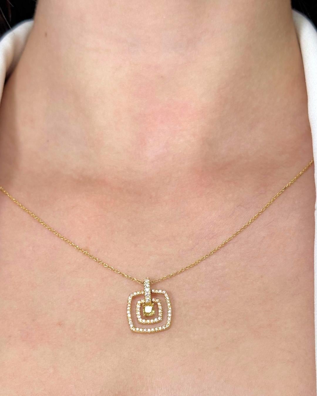 Stunning 0.68ct Diamonds Necklace with Double Halo Pendant in 18k Yellow Gold - GIA Certified

Make an elegant statement with this exquisite 18K yellow gold necklace, featuring a stunning 0.28ct cushion-cut diamond in a rare fancy deep orangy yellow