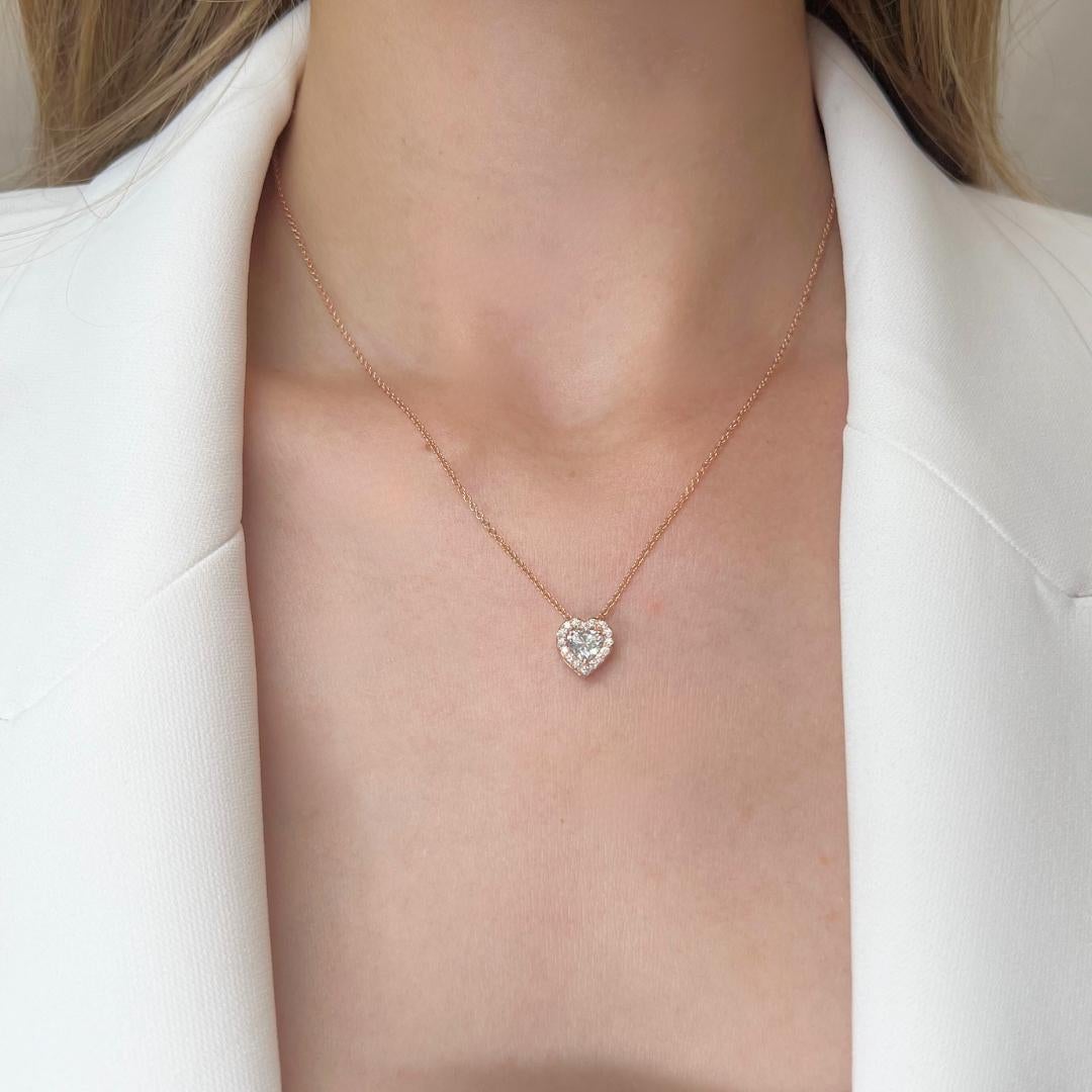 Stunning 0.72ct Double Excellent Ideal Cut Diamonds Halo Necklace with Pendant in 14k Rose Gold - GIA Certified

Embrace the romance of this enchanting 14k rose gold necklace, centered with a dazzling 0.52-carat heart-shaped diamond. With a double