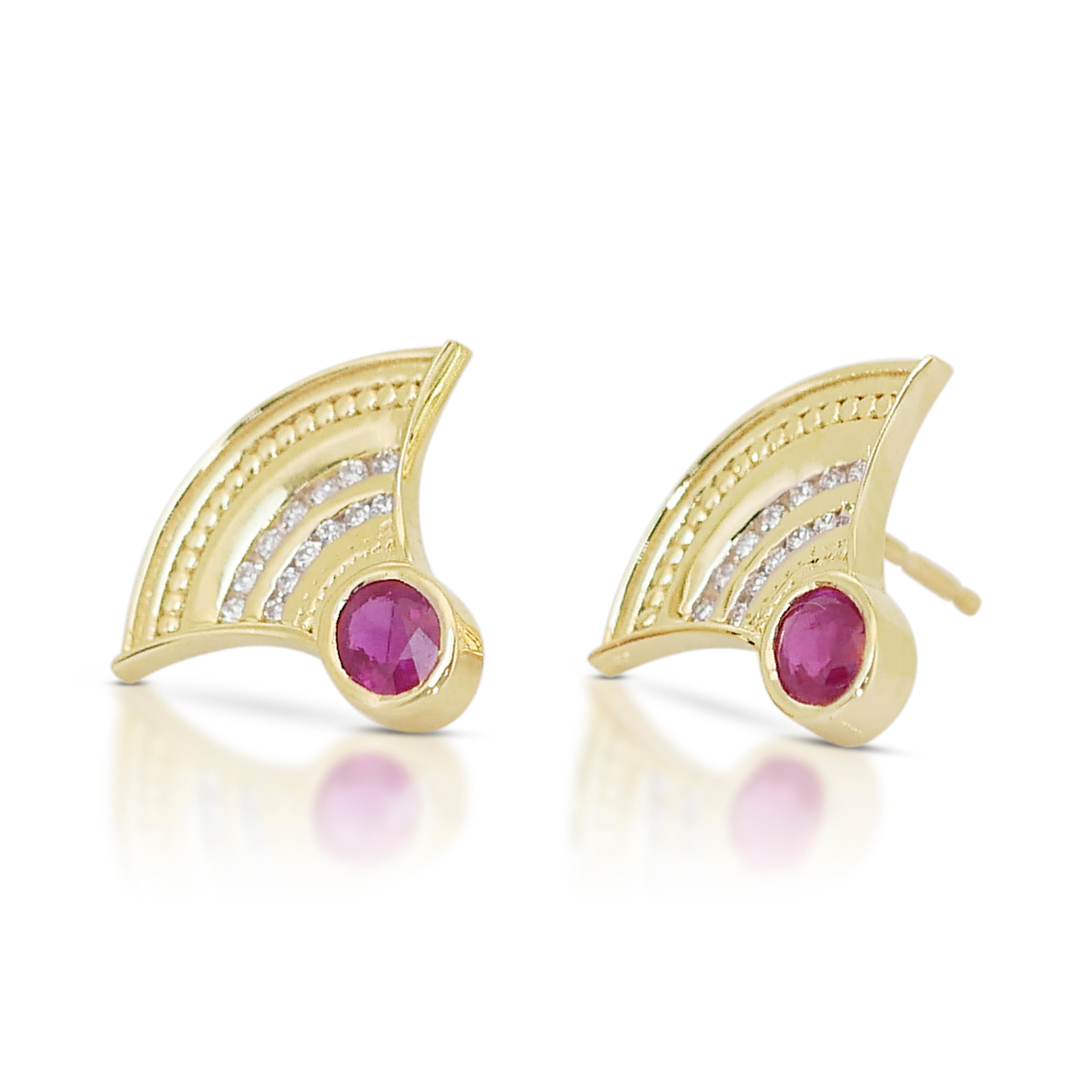 Stunning 0.75ct Rubies and Diamonds Stud Earrings in 14k Yellow Gold - AIG Certified

Discover the elegance of these 14k yellow gold earrings featuring two exquisite oval-shaped rubies, totaling 0.60 carats. The rich red color of the rubies,