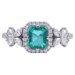 Stunning 0.87 Carats Zambian Emerald Ring set with Diamonds in 18 kt White Gold
