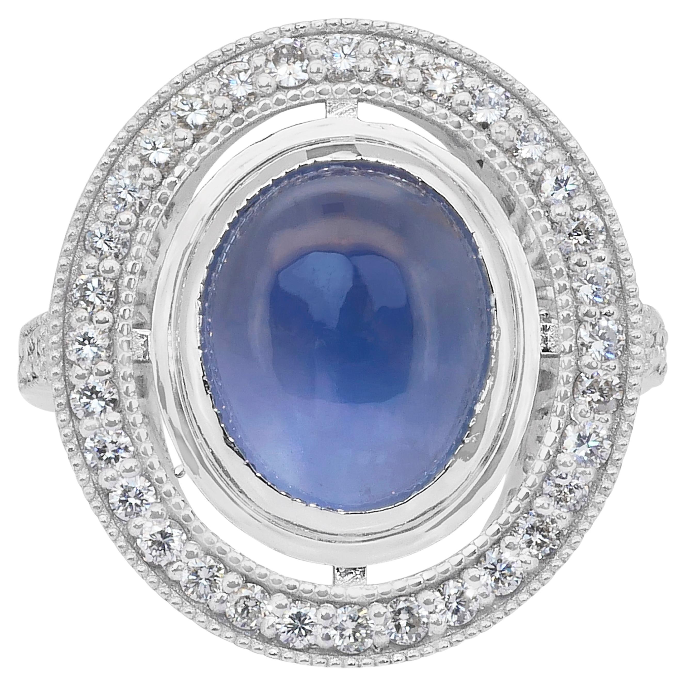 Impresionante Anillo de Cóctel de Zafiro Estrella y Diamantes de 10,92 ct en Oro Blanco de 18k