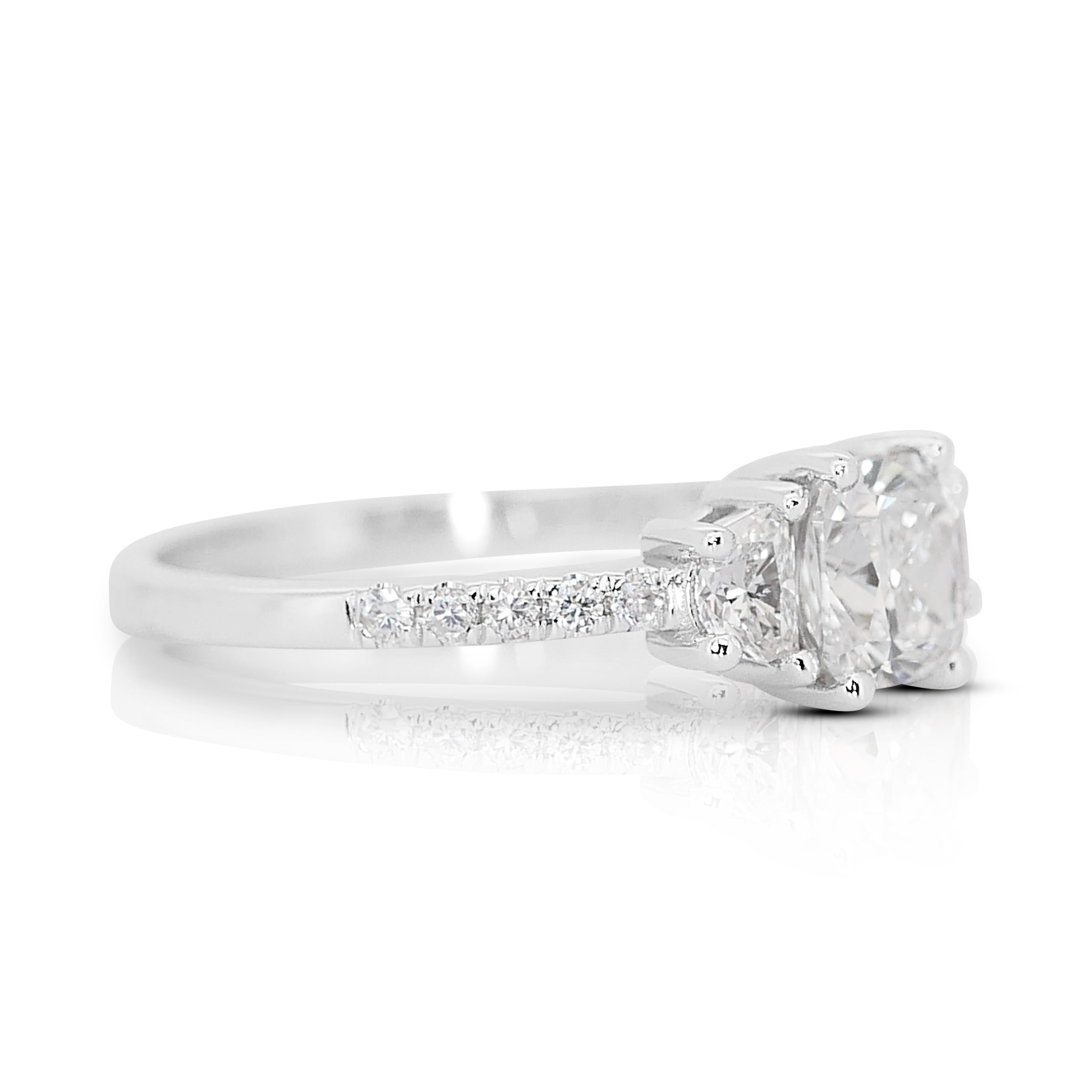 Stunning 1.10ct Diamonds 3-Stone Ring in 18k White Gold - GIA Certified

Indulge in the epitome of luxury with this exquisite 18k rose gold 3-stone ring, featuring a stunning 0.70-carat cushion-cut diamond at its center. Enhanced by a double
