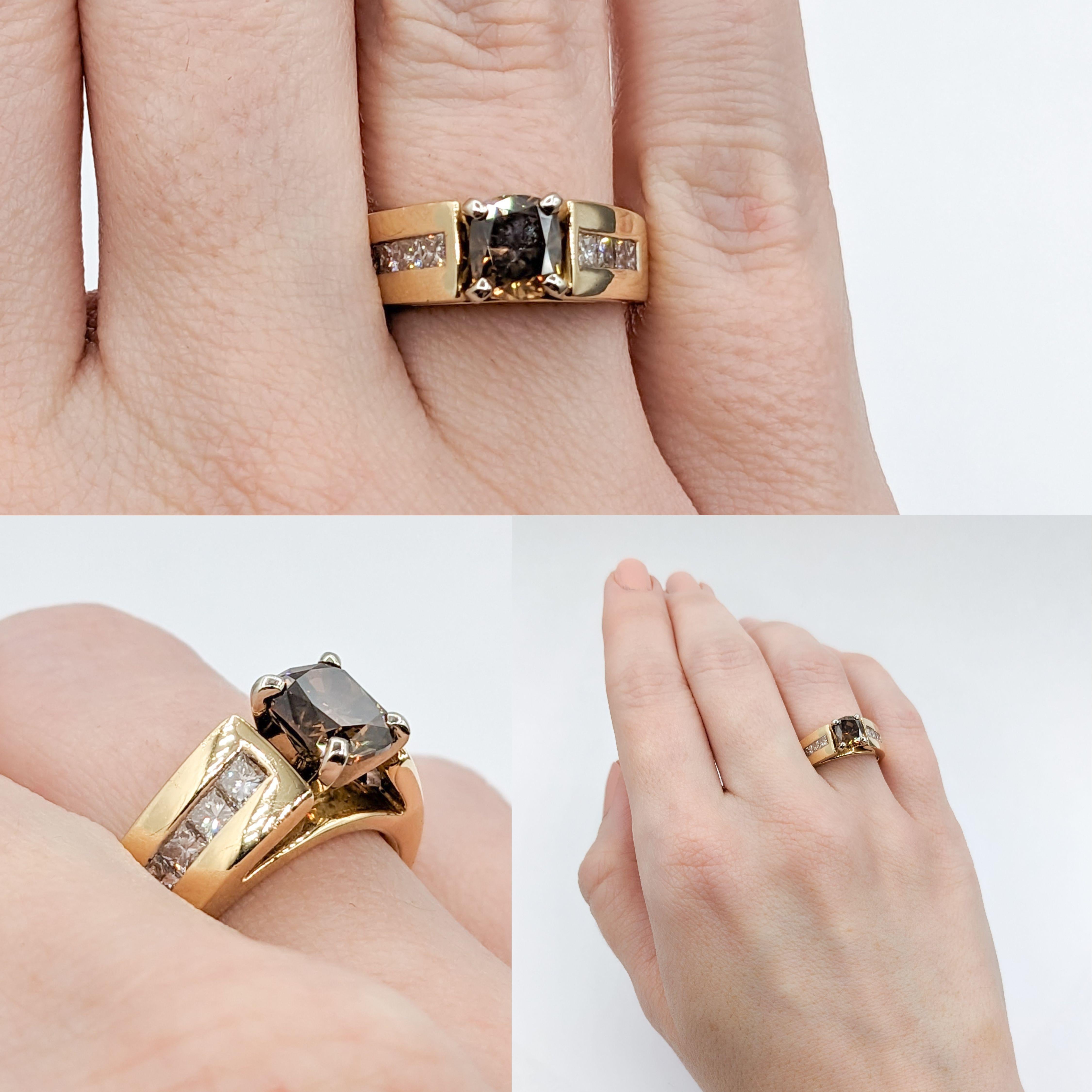 Stunning 1.15ct Cushion Cut Brown Champagne Diamond Engagement Ring

Indulge in the warmth of luxury with this stunning 14k yellow gold ring. At its heart lies a captivating 1.15ct cushion-cut diamond, radiating with an SI1 clarity and a Fancy Brown