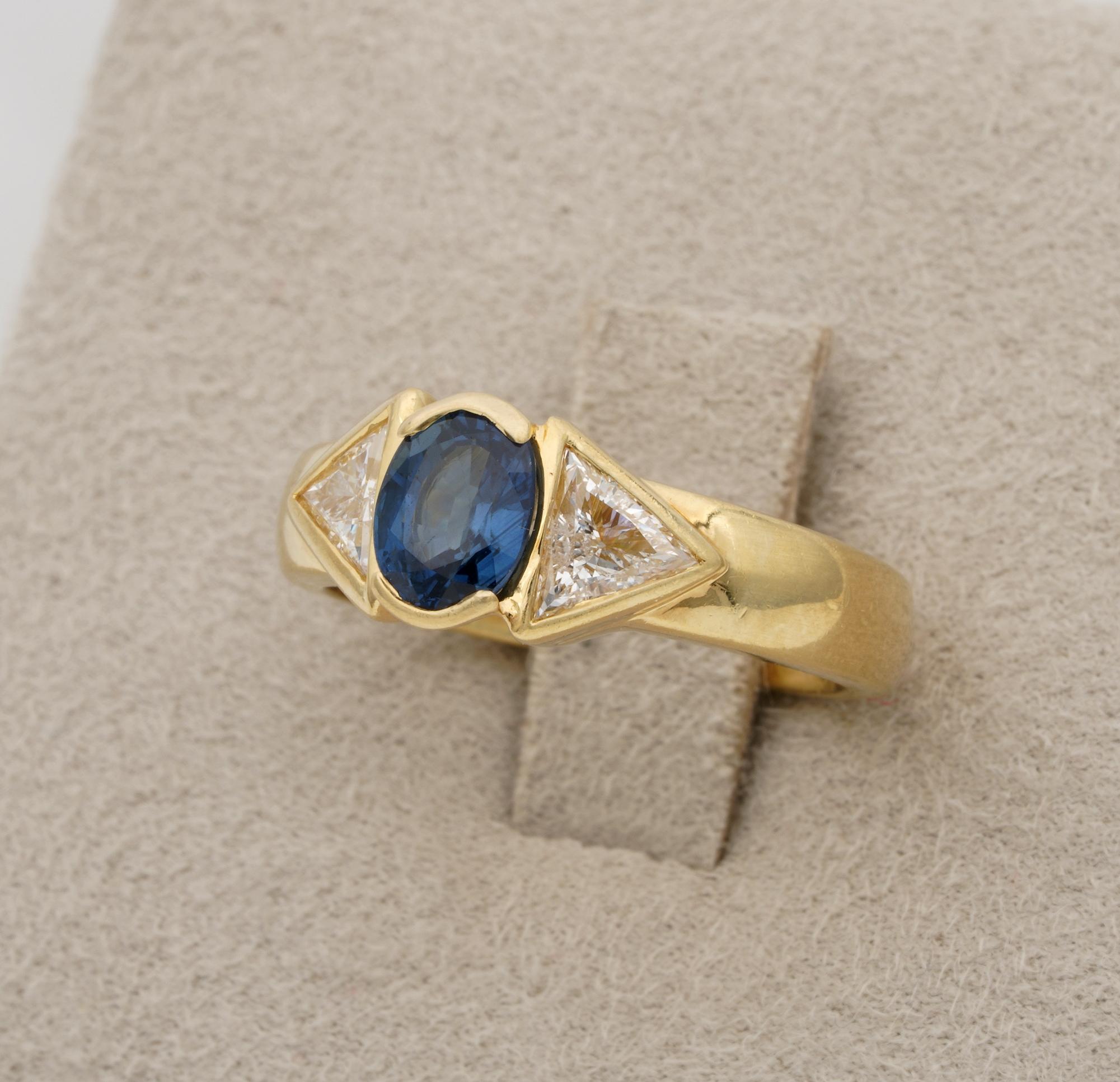 Oval Cut Stunning 1.20 Carat Natural Sapphire 1.10 Carat Triangular Diamond Ring For Sale