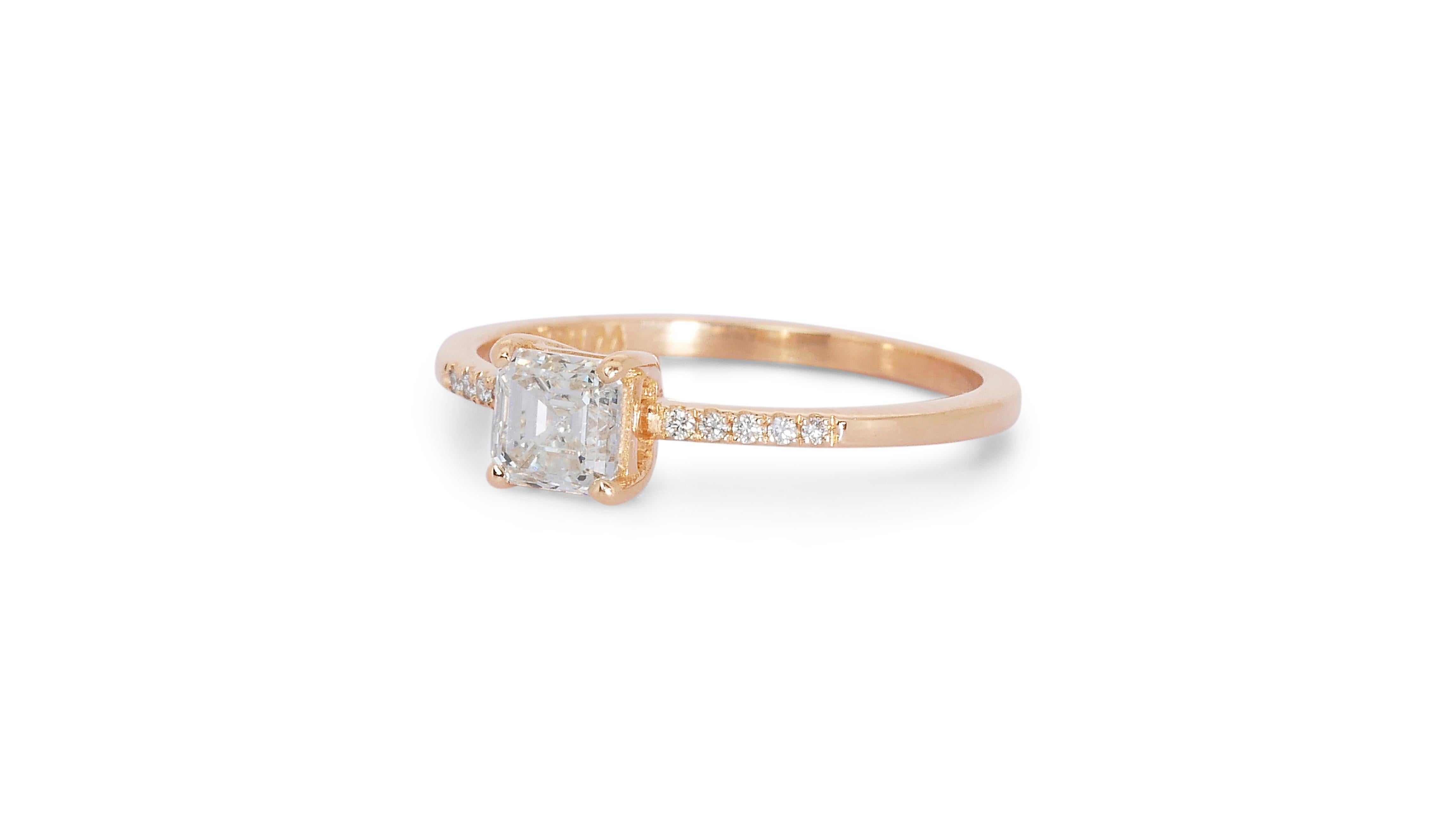 Stunning 1.20ct Diamonds Pave Ring in 18k Rose Gold - GIA Certified

This captivating 18k rose gold ring features a stunning 1.10ct square-cut diamond as its centerpiece, offering exceptional brilliance and sophistication. Enhancing the design are