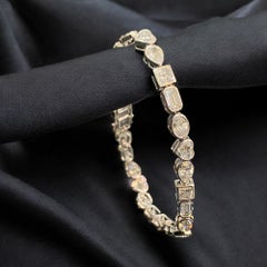 Stunning 12.50 Carats F/VS1 Multi-Shape Diamonds Tennis Bracelet in 14K Gold