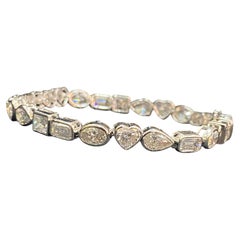 Stunning 12.50 Carats F/VS1 Multi-Shape Diamonds Tennis Bracelet in 14K Gold