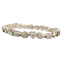 Stunning 12.50 Carats F/VS1 Multi-Shape Diamonds Tennis Bracelet in 14K Gold