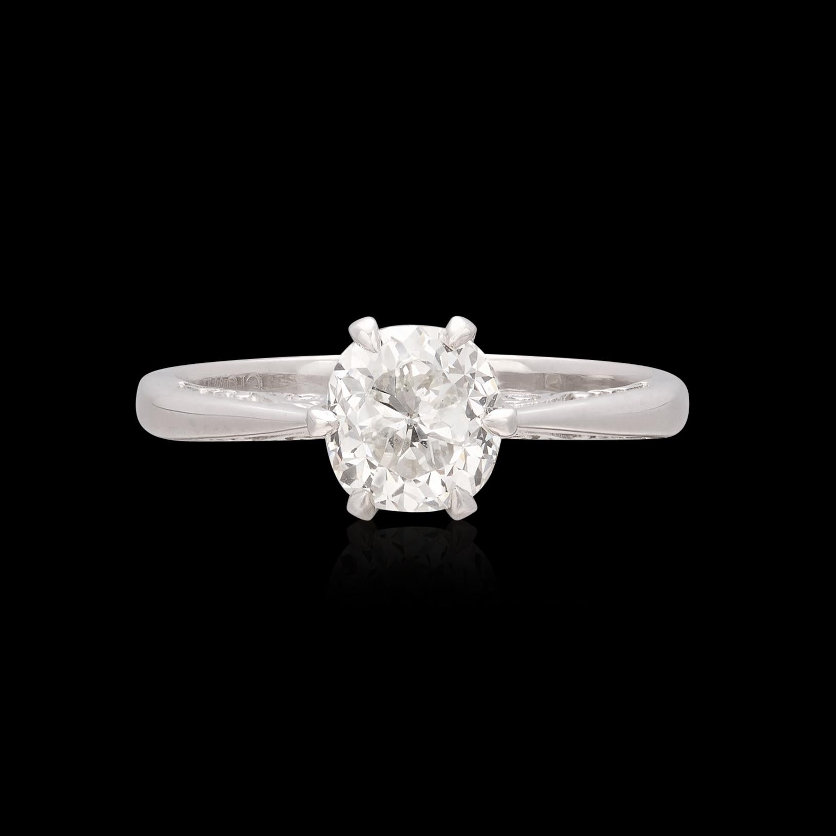 Classic elegance featuring a magnificent center stone. This platinum  tulip inspired ring features an extraordinary 1.33 carat GIA graded diamond as the centerpiece. As rare as it is beautiful, the center stone is a Crown Jubilee, a GIA recognized